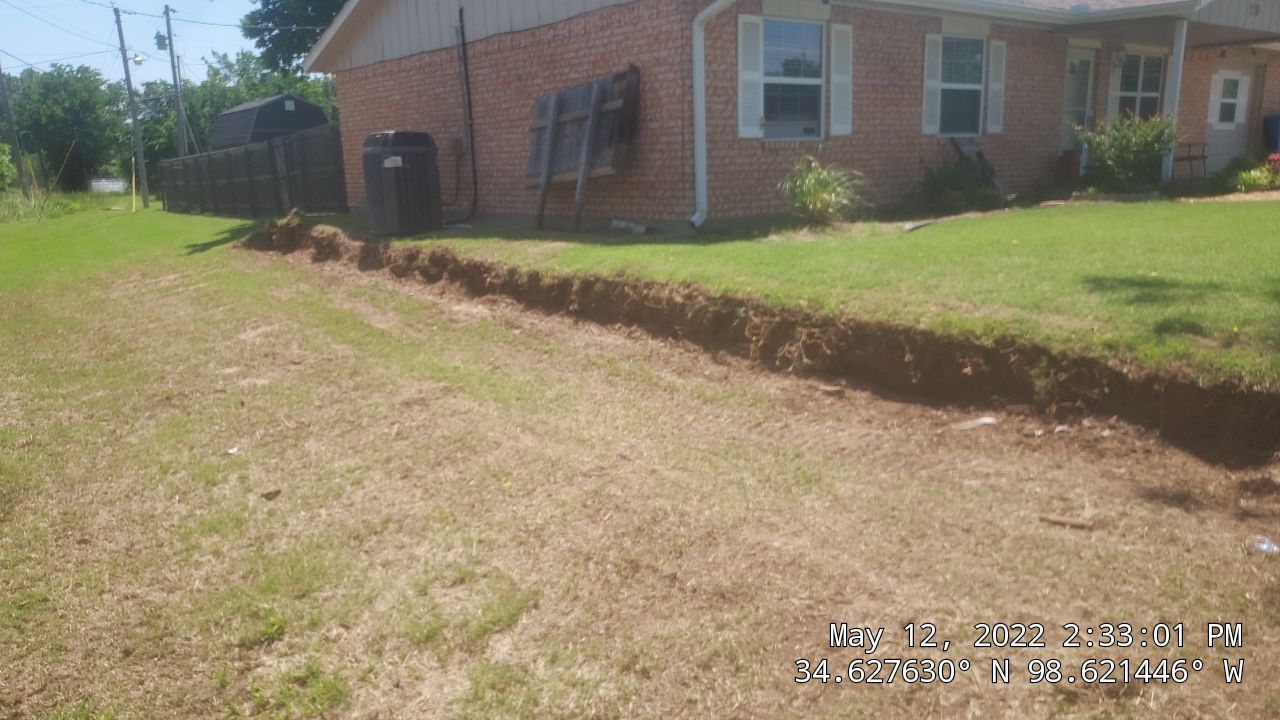 Retaining Wall using Rocks by Clays Services Inc
