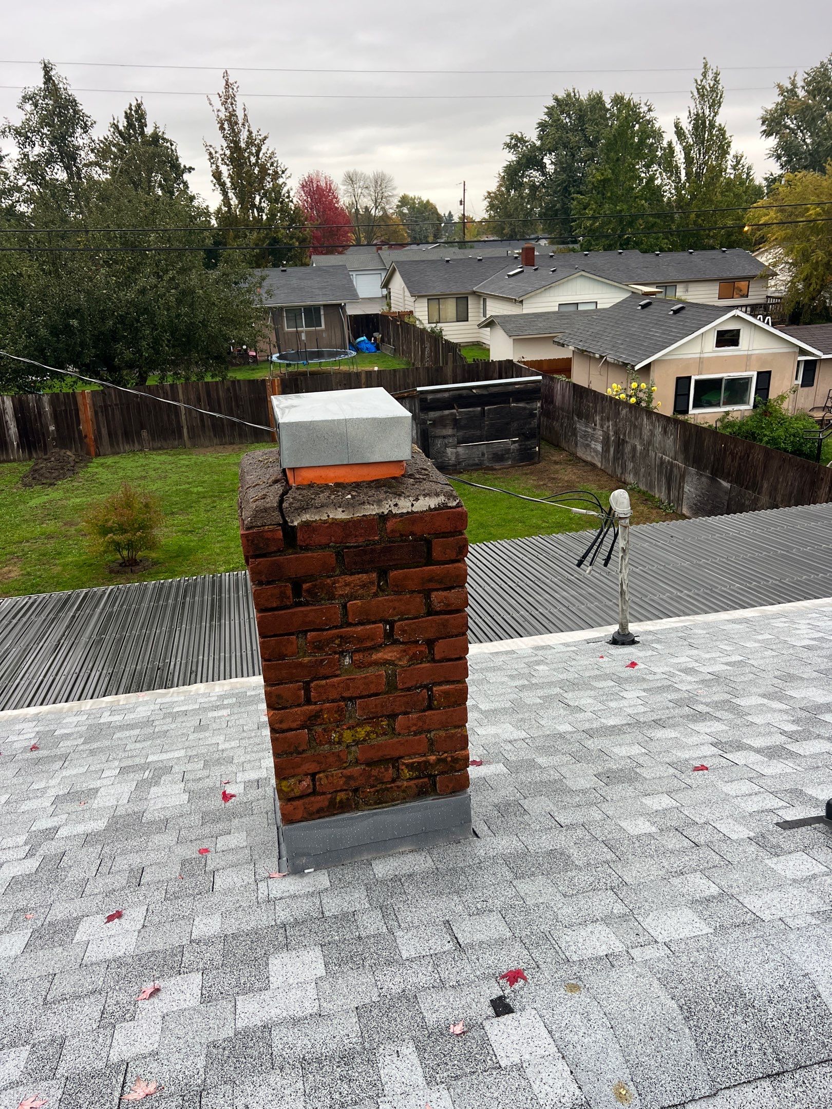 Residential Roofing Installation using IKO Dynasty (Color: Frostone Grey) by Orezona Building & Roofing Company, Inc.