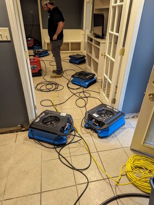 Emergency Service Water Mitigation Using Air Movers and Dehumidifiers