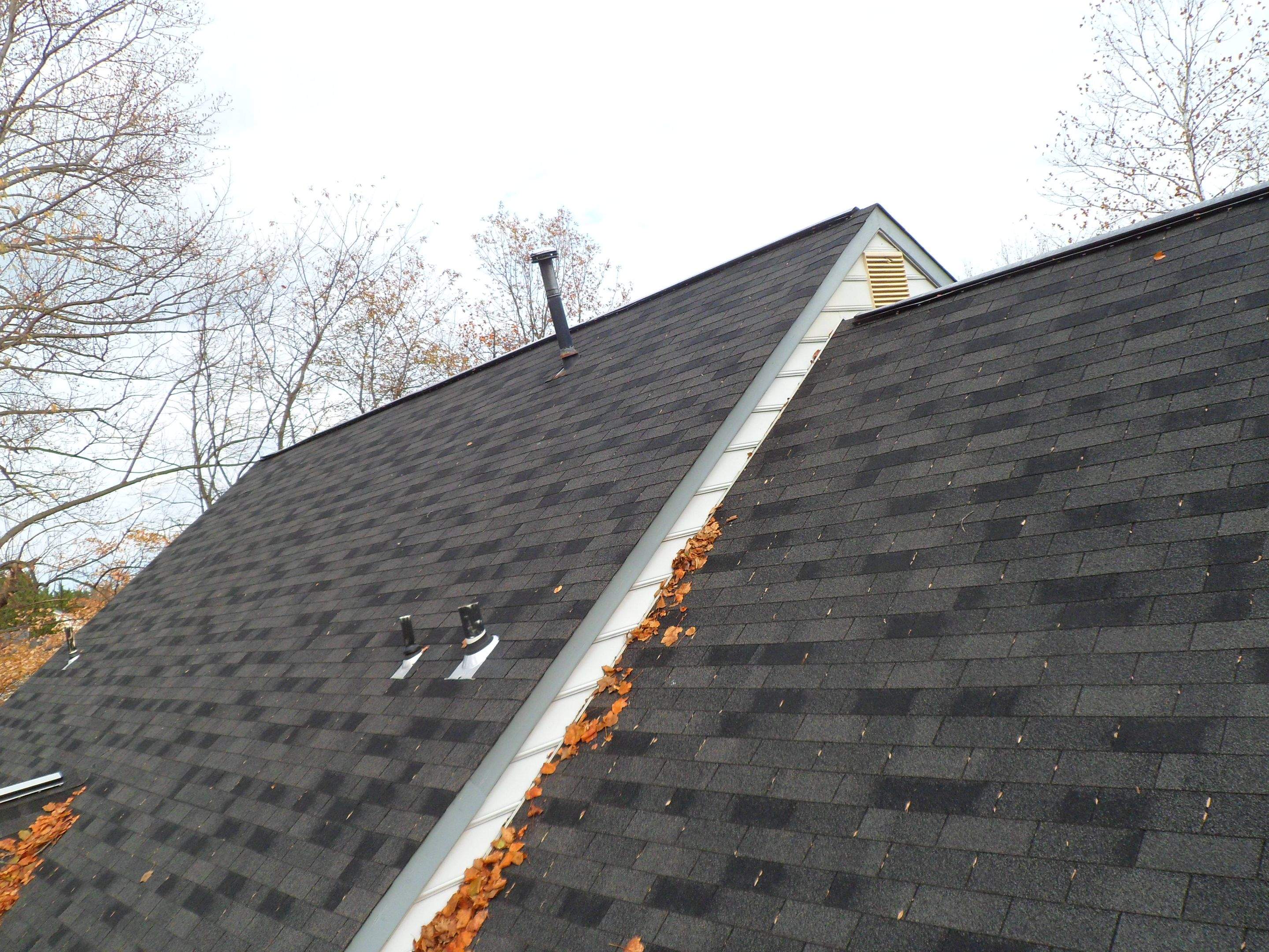Residential Roofing Installation using Charcoal Black by Alpha Design Services
