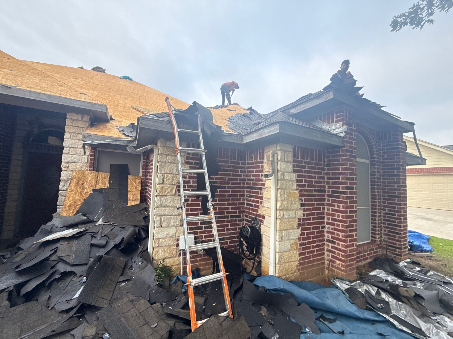 Residential Roof Replacement with IKO Cambridge Shingles in Shady Shores by First Out Roofing 