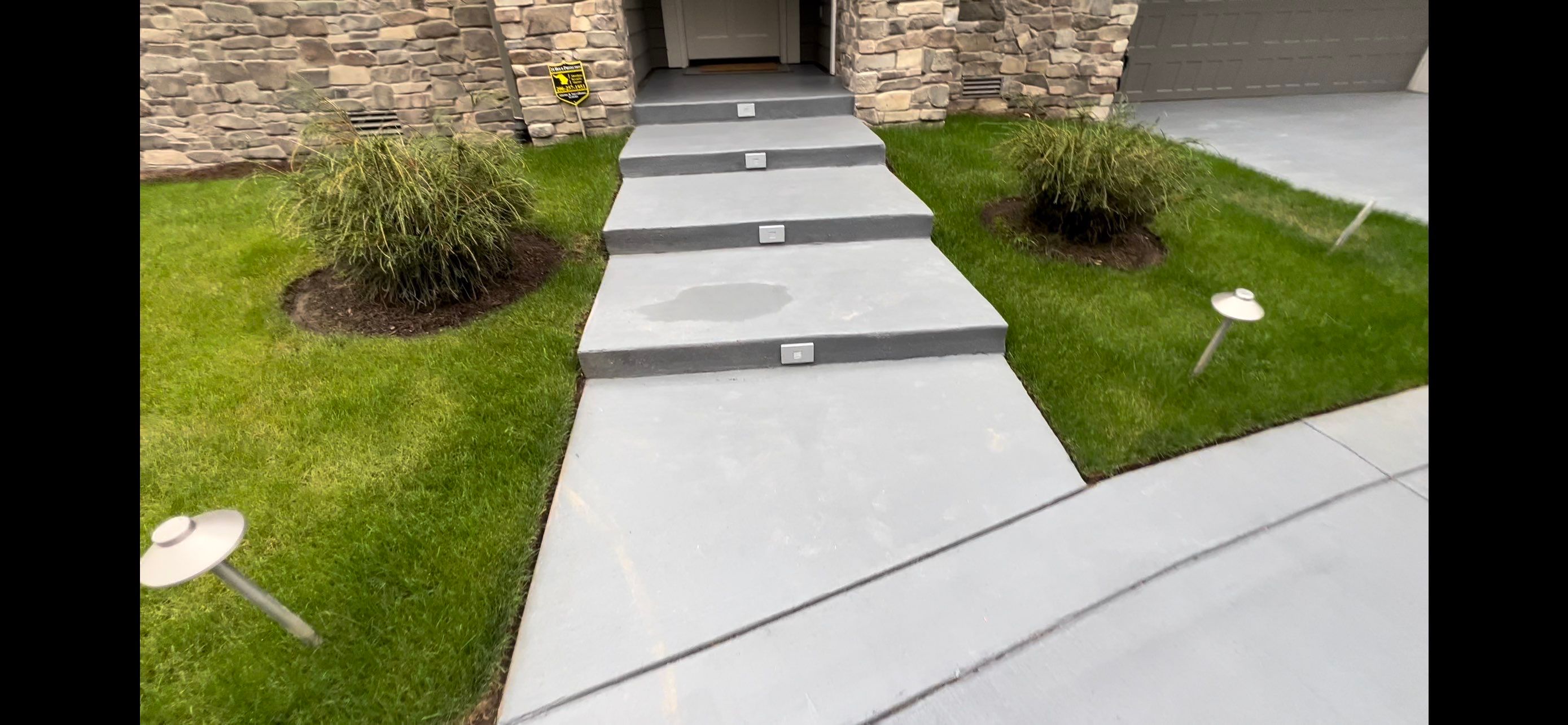 Melanie | Concrete Driveway  by Jireh Asphalt & Concrete Inc 