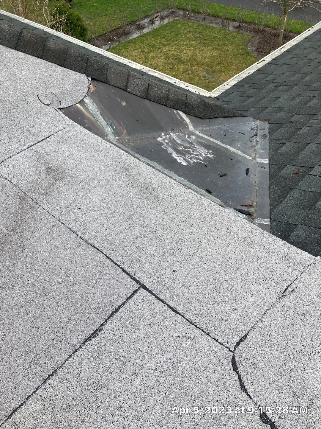 Asphalt Roof Replacement by Custom Installations