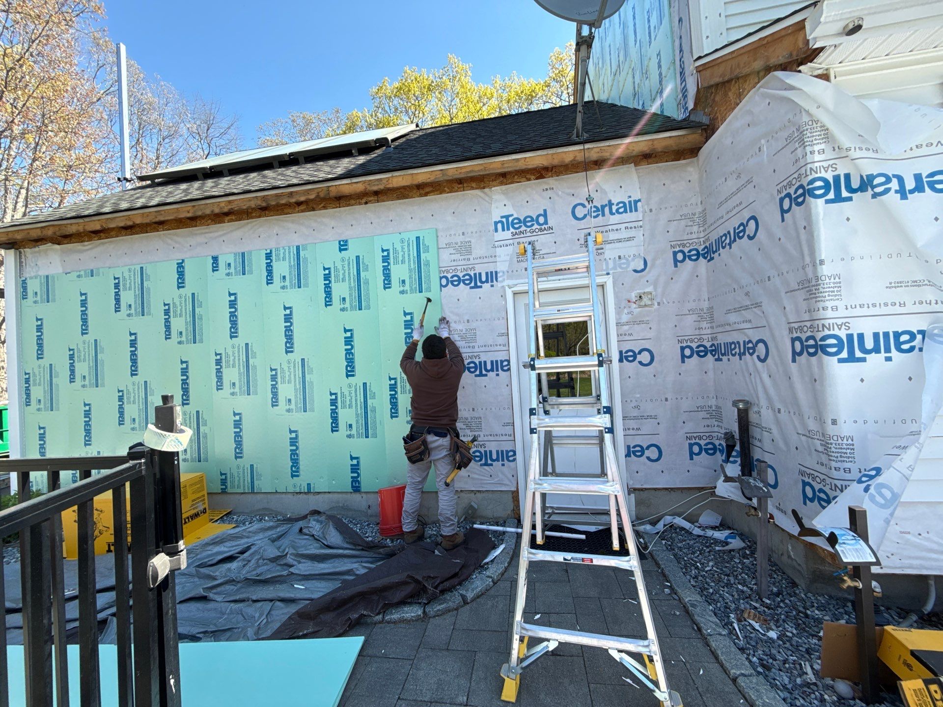 Siding facelift with Cert Monogram D/4 x16'8" clapboard, Midnight Blue & Cert Monogram D4x25' clapboard, Midnight Blue by DiGiorgi Roofing and Siding Inc
