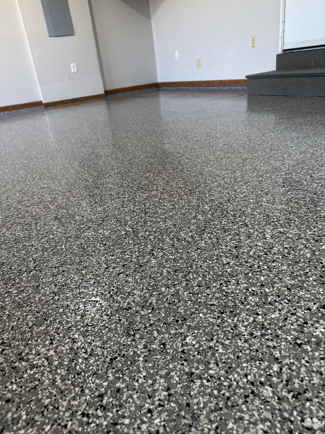 Epoxy Garage Floor Transformation and Concrete Repair in Beatrice by Goat Coatings