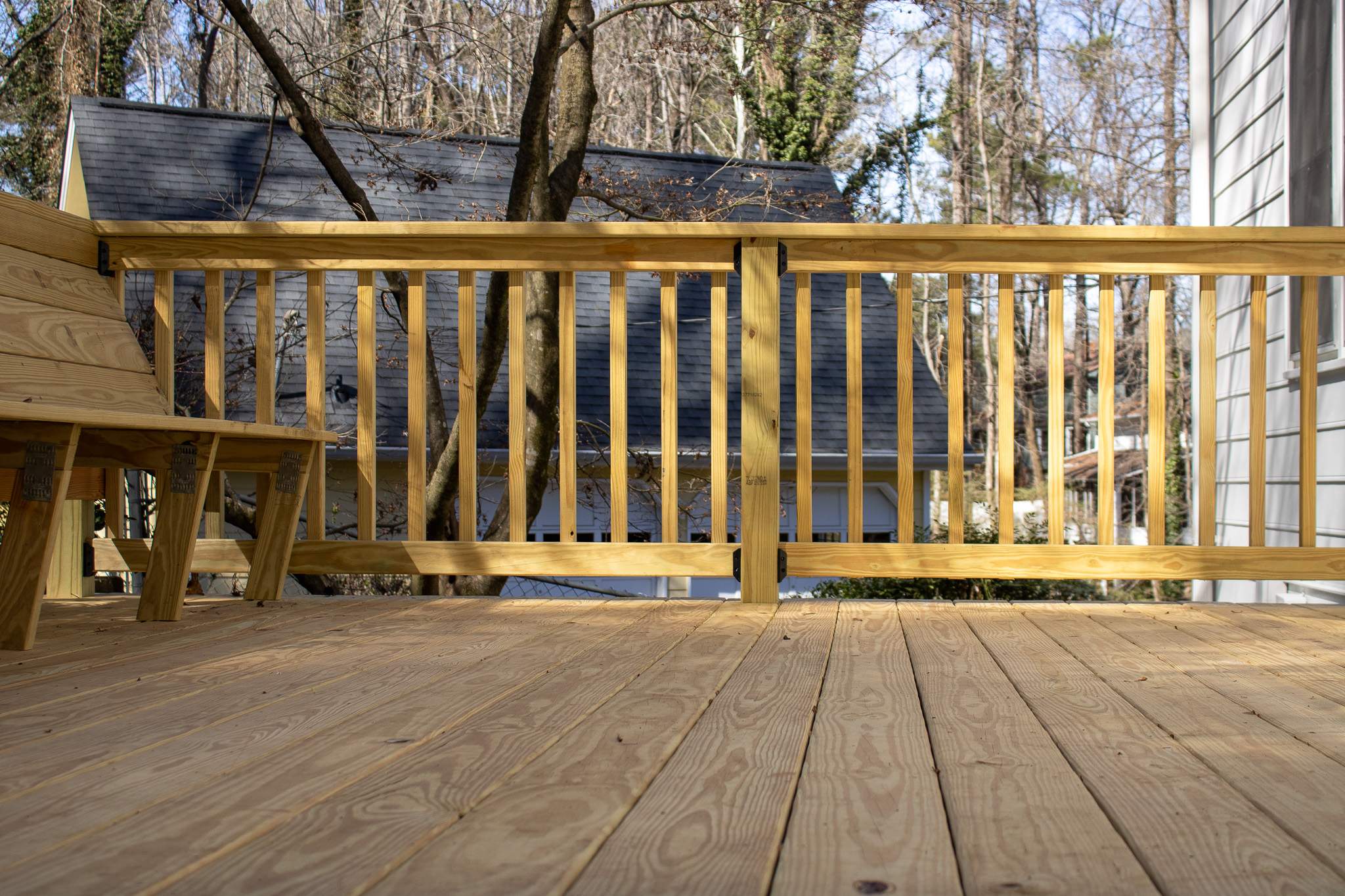 Deck Resurface with Wood Bench Install Using Pressure Treated Pine by Nelson Exteriors