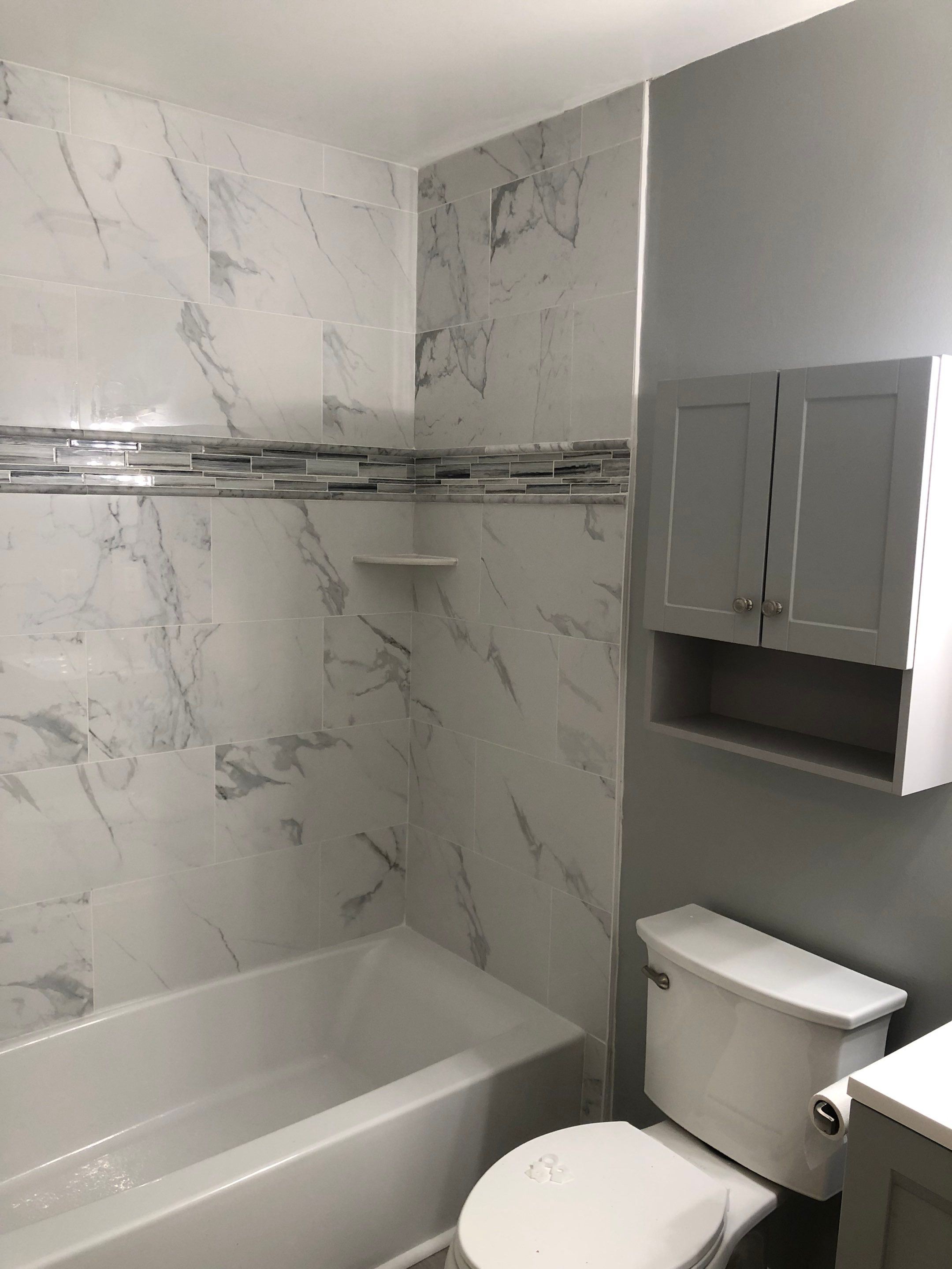 Bathroom Remodel using Tile by Home Concepts Construction