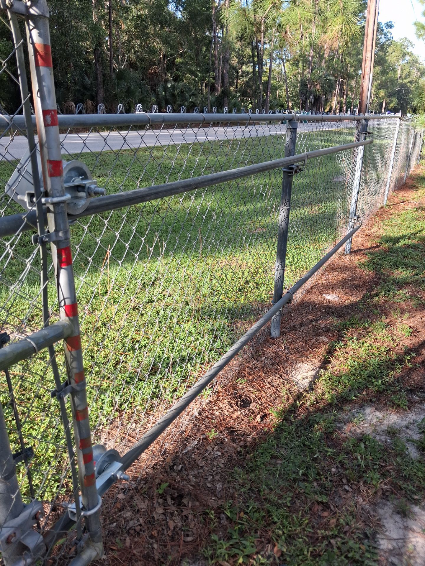 Naples Chain Link Sliding Gate Repair by True Fence LLC
