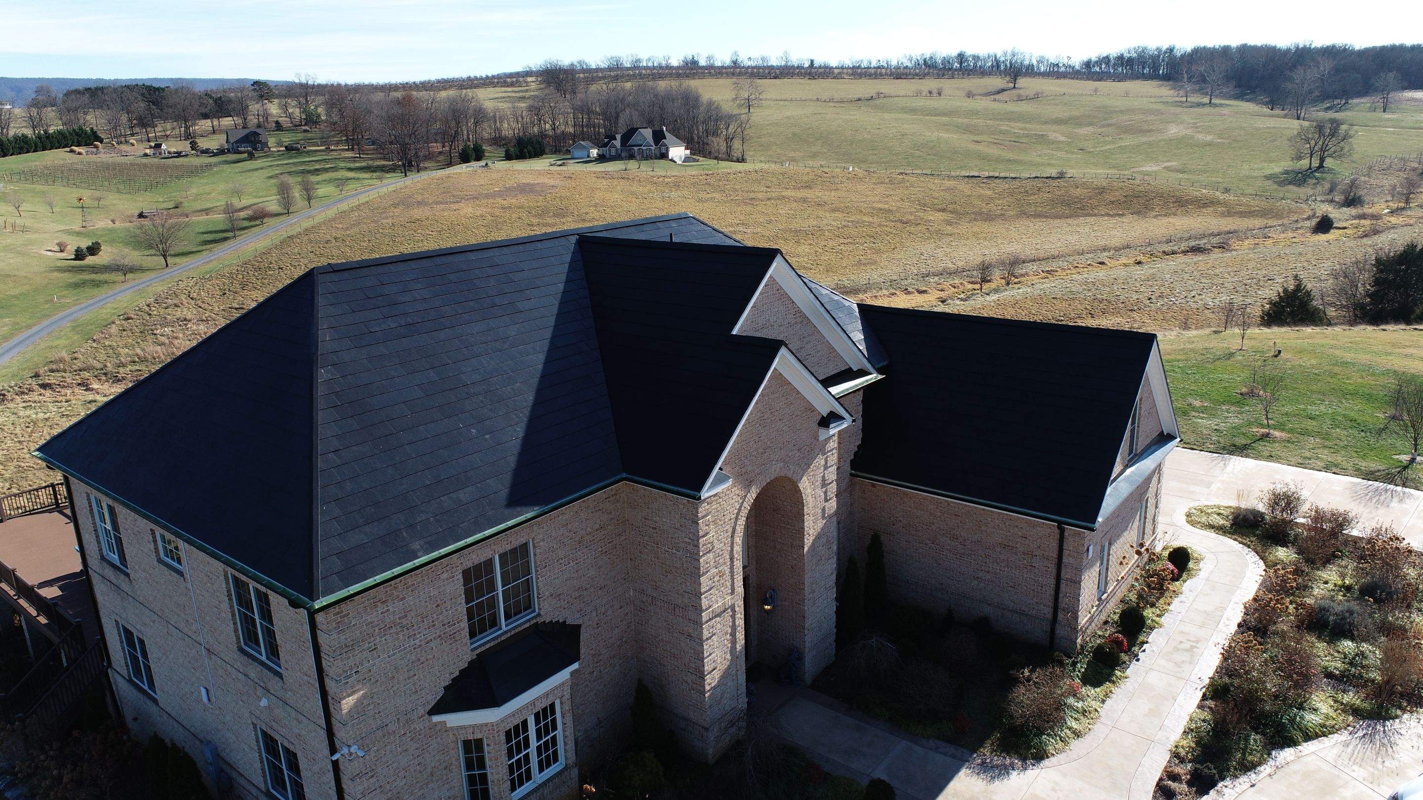 Tesla Solar Roof Replacement by American Home Contractors