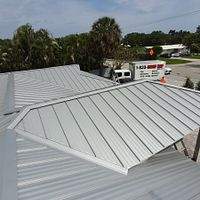 .032 Aluminum 1.5" Mechanical Seam Silver Metallic by Total Roofing System The Metal Roof Experts