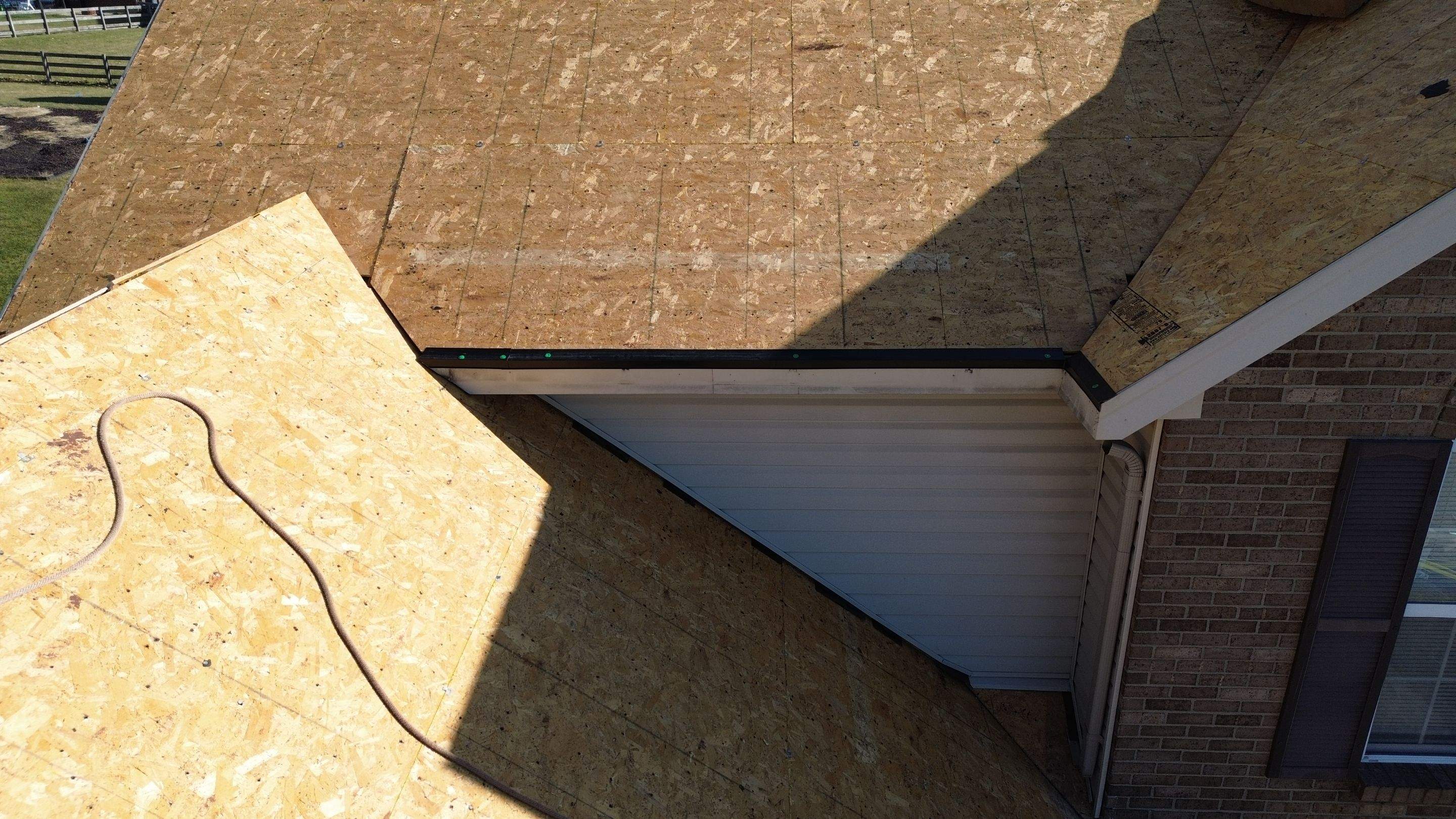 West Hamilton - Pristine Black & Gutters by Tamlin Roofing