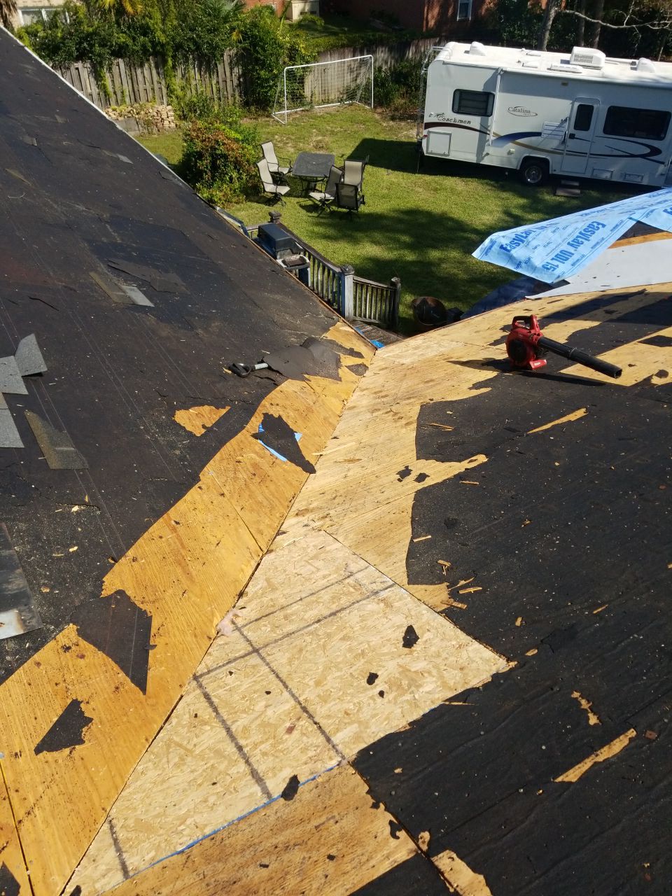 Residential Roofing Installation using Roof Replacement by American Roofing & Construction LLC
