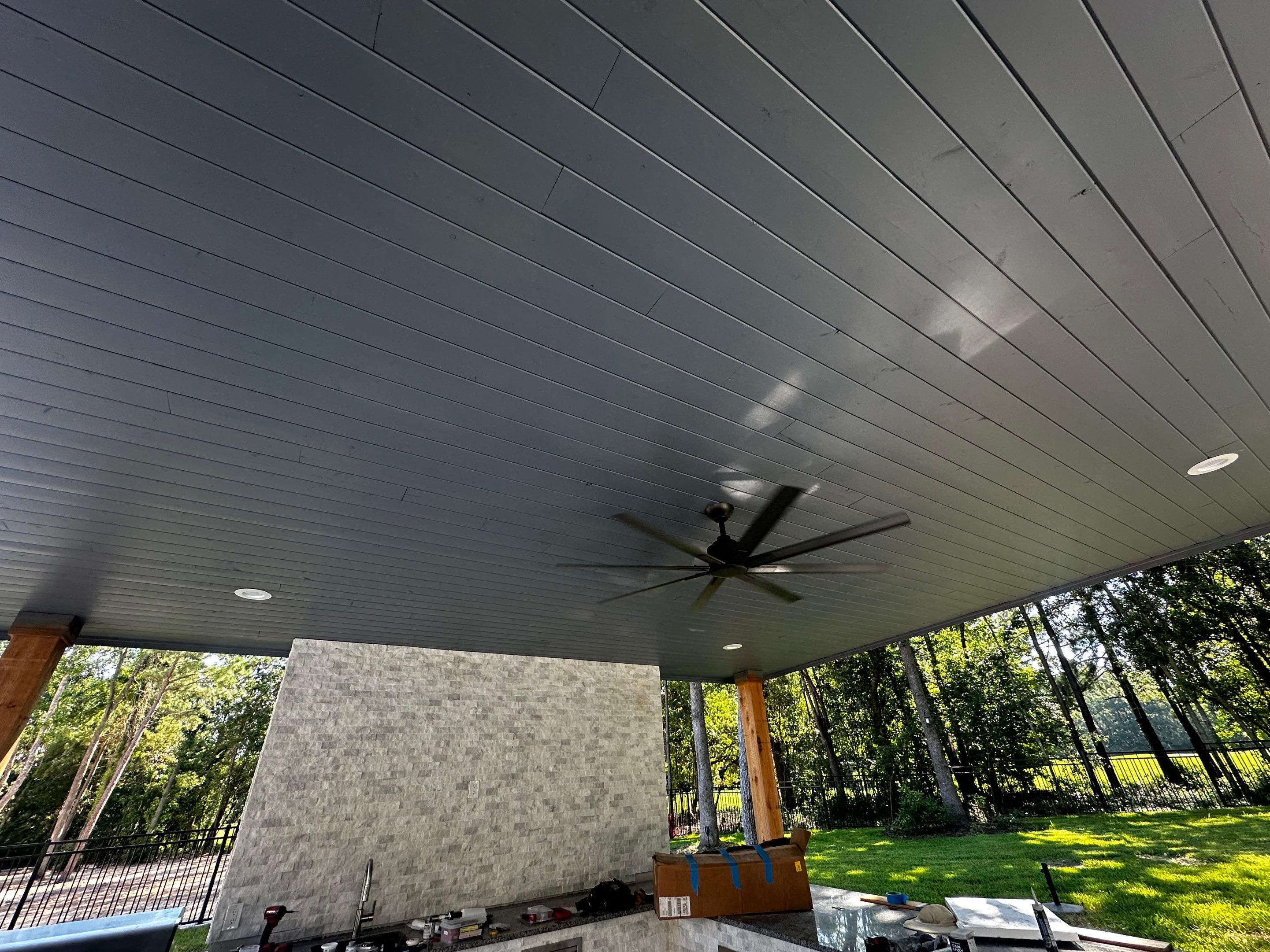 Modern Patio Cover and Kitchen in Montgomery by SophAlx LLC