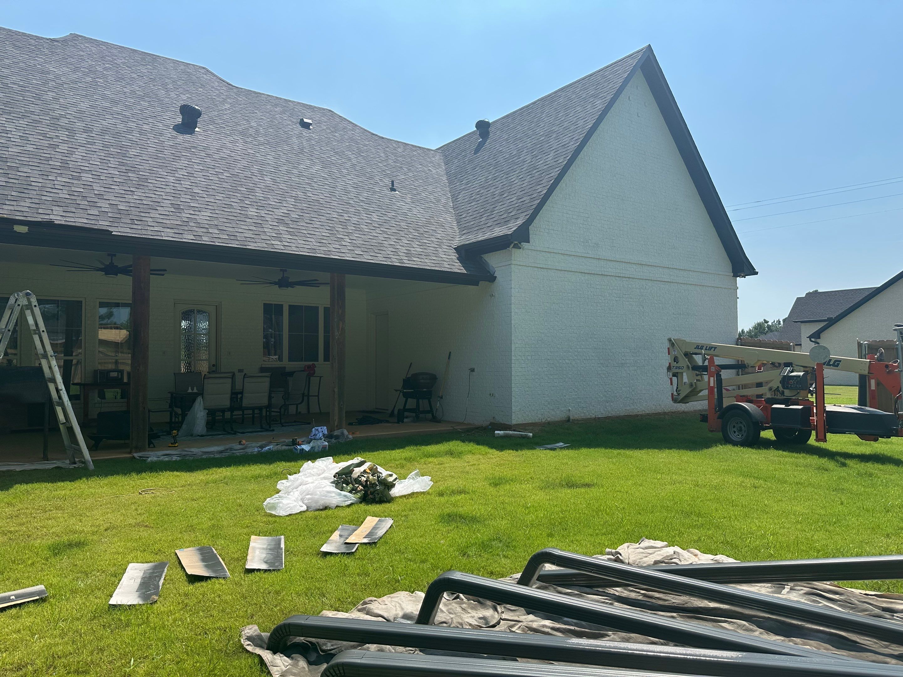 Exterior Painting in Longview, TX | Roof & Eaves in Elegant Black by Quality Coats Painting