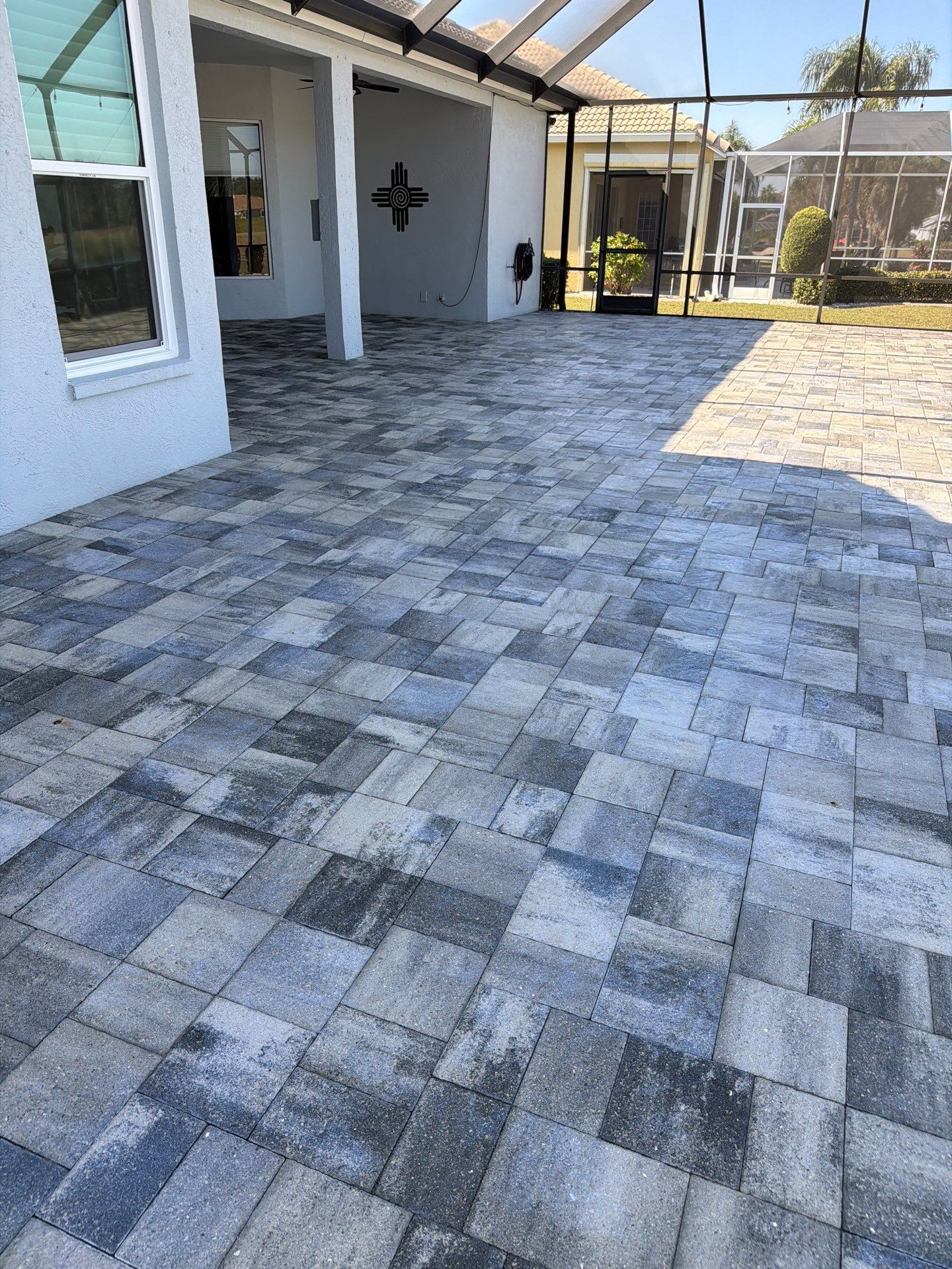 Paver Sealing and Restoration for Screened Lanai in Sun City Center by Supreme Paver Experts