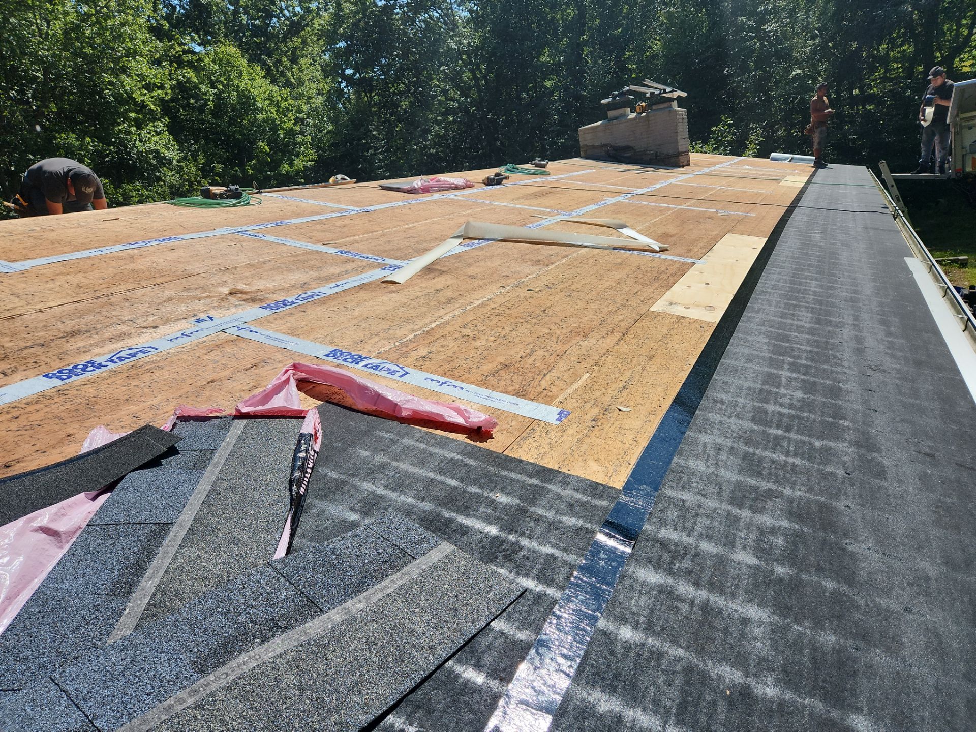 Commercial Roofing Installation using Owens Corning TruDefinition Duration AR - Harbor Blue by A Plus Exterior