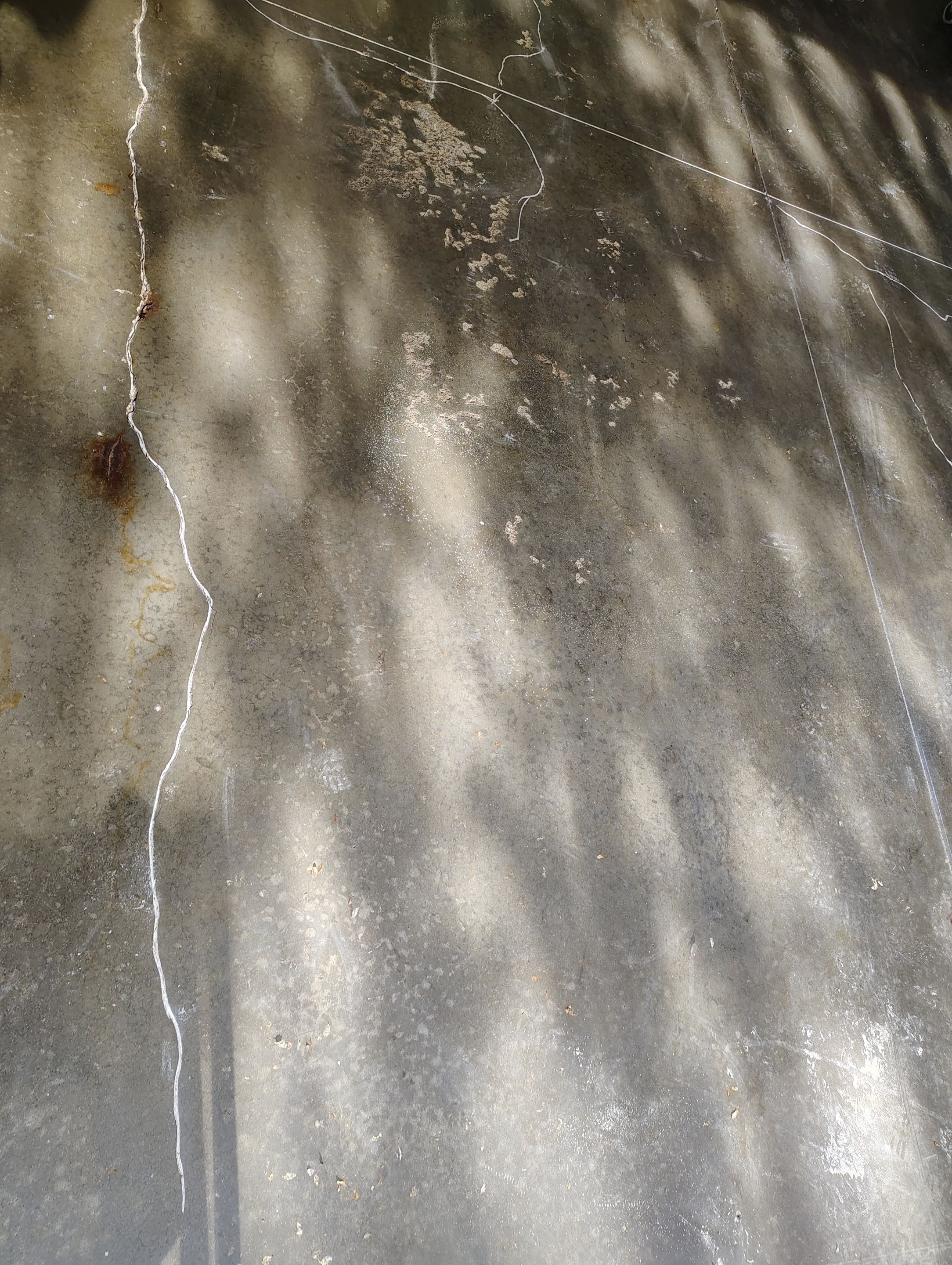Garage Floor Concrete Coating and Crack Repair in Sioux Falls by Select Painting, Coatings & Garage Cabinets