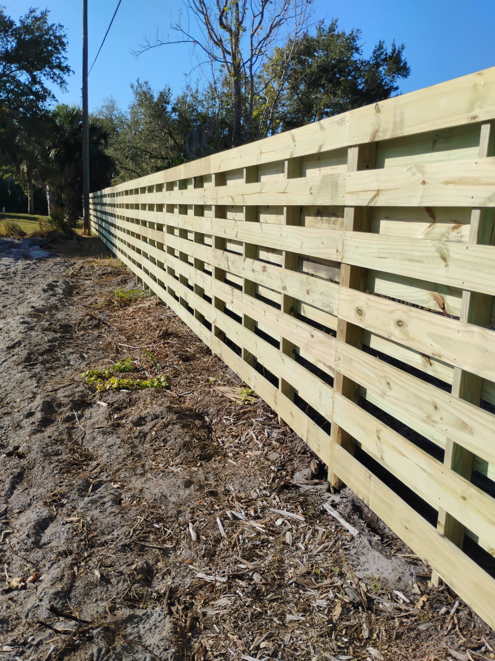 Horizontal Shadowbox Fence in Port Charlotte by True Fence LLC