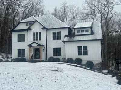 Exterior Siding & Gutter System Upgrade