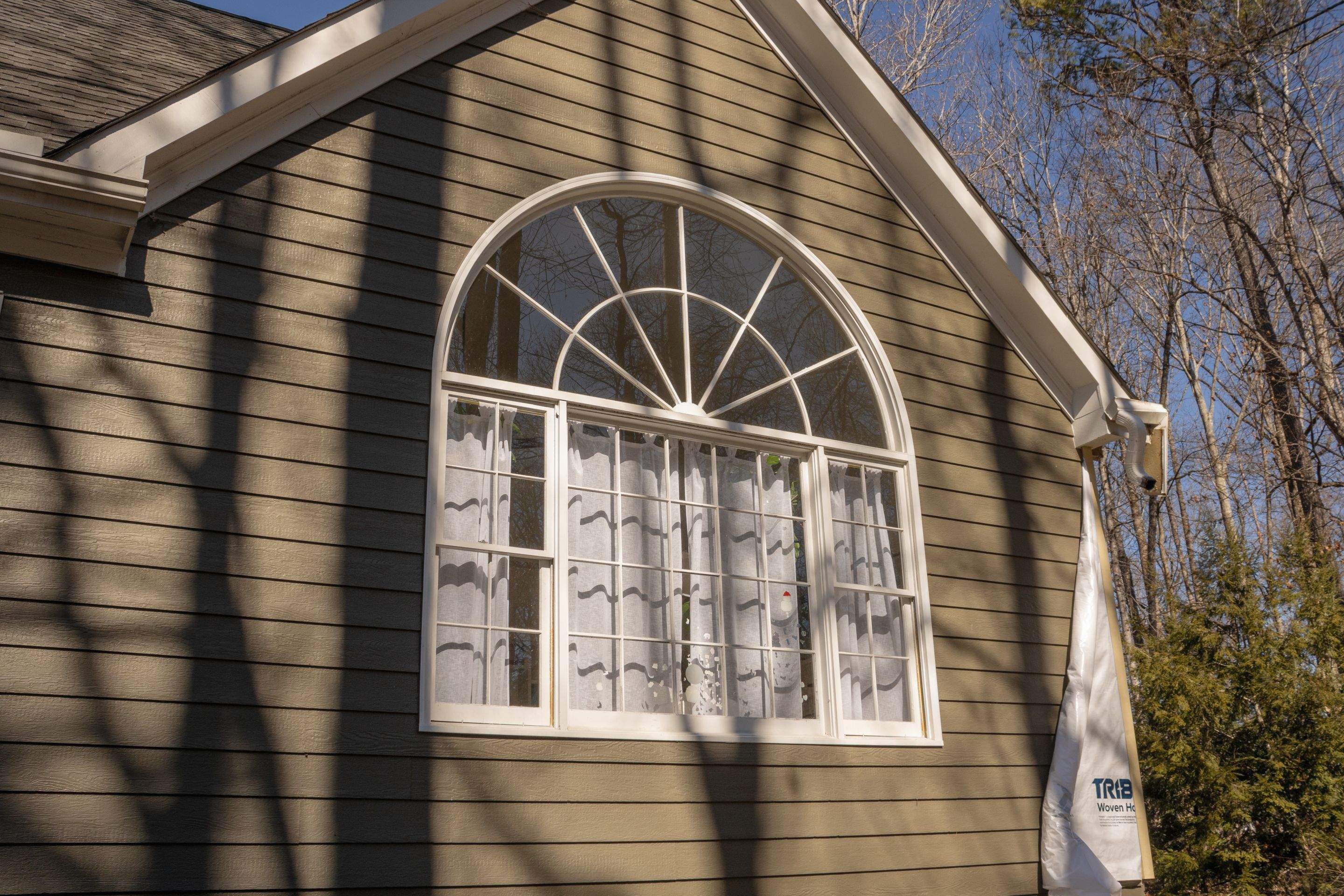 Marietta, GA Full Siding Replacement, 30+ Window Replacements, Screened-In Porch to Sunroom Conversion, Gutter Replacement, and Exterior Painting by Nelson Exteriors