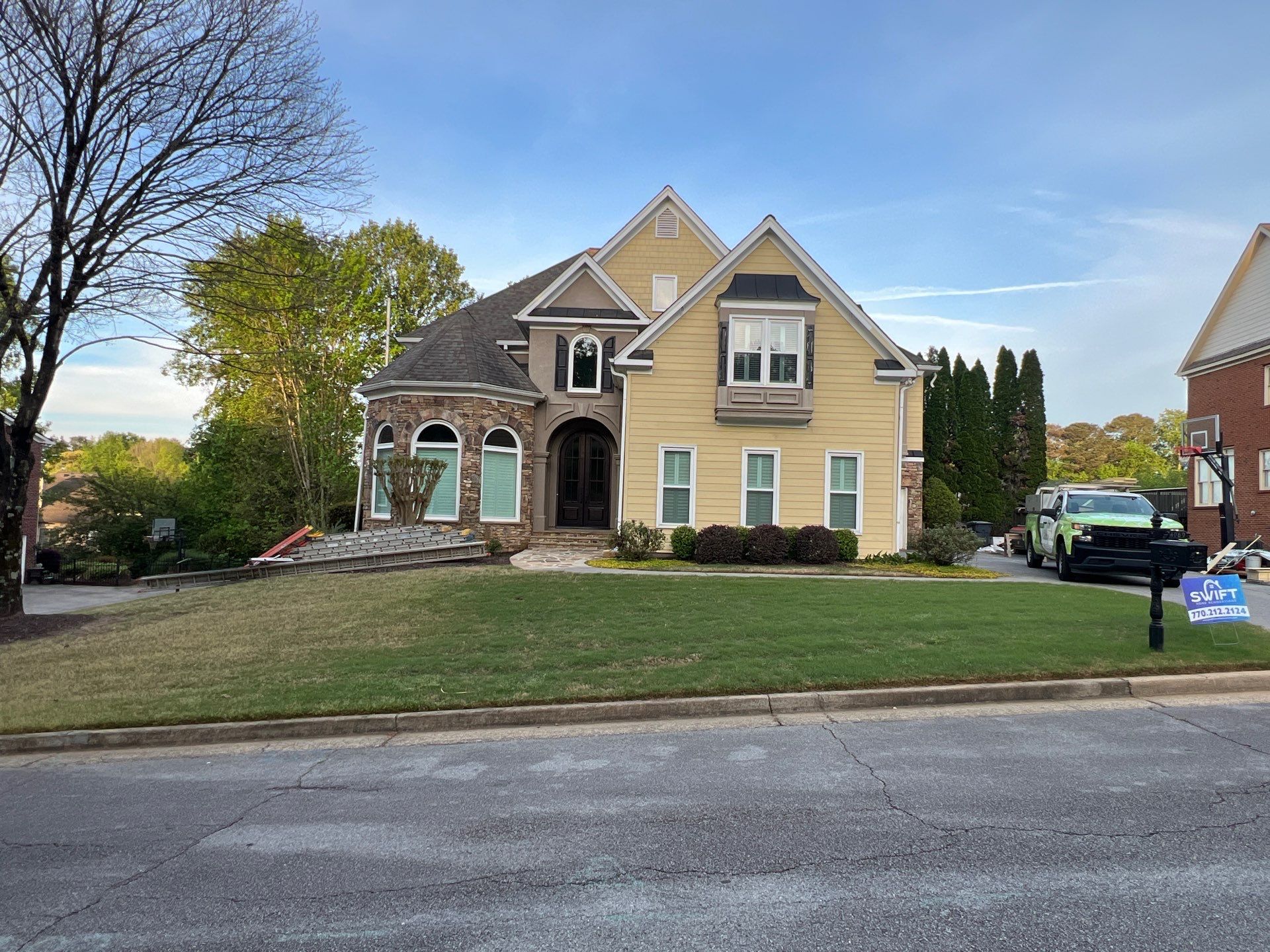 Full Exterior Siding Replacement and Stone Veneer Installation in Roswell by Swift Home Renovations