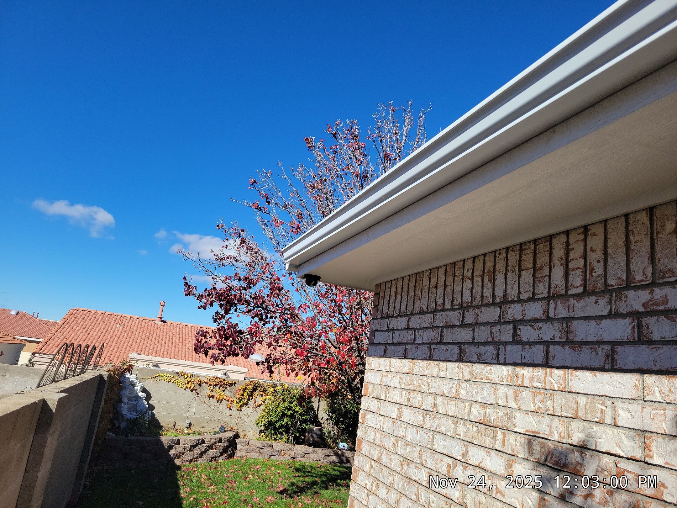 Seamless White Gutter and Downspout Installation in Albuquerque by Doyle Roof Masters Inc