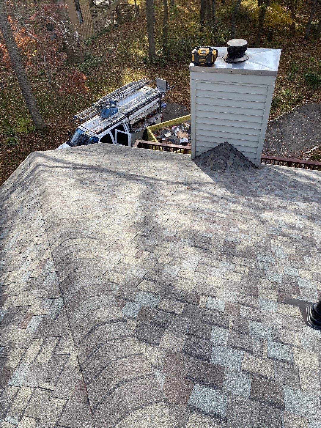 Install new shingles and new skylights  by Alpha Design Services