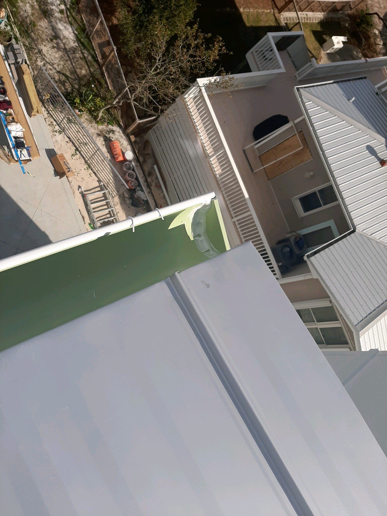Gutter Installation Using 6 Inch Seamless Aluminum Gutters by Gutter Professors