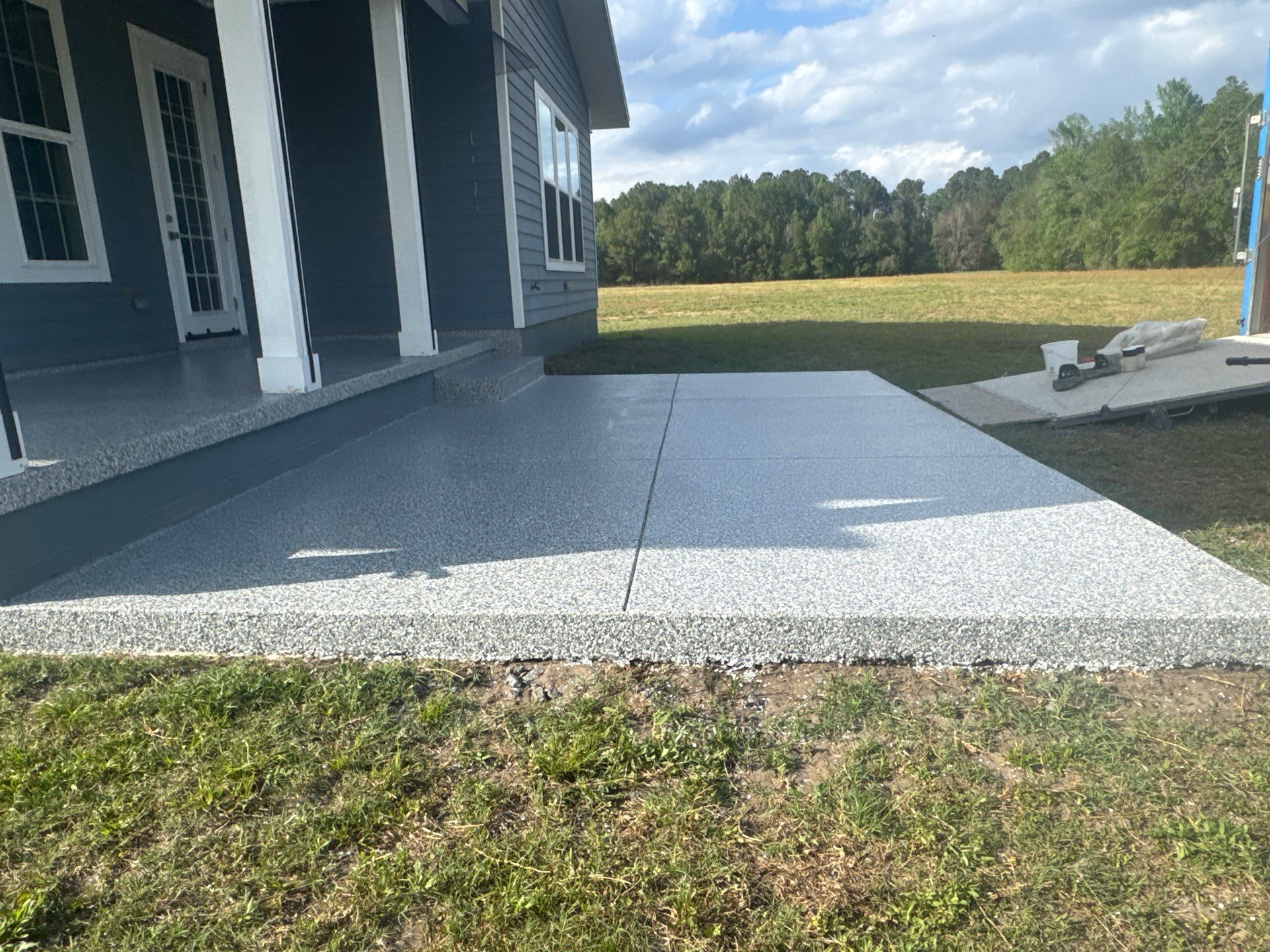 Back Patio in Slate Stone by Cross Creek Concrete Coatings