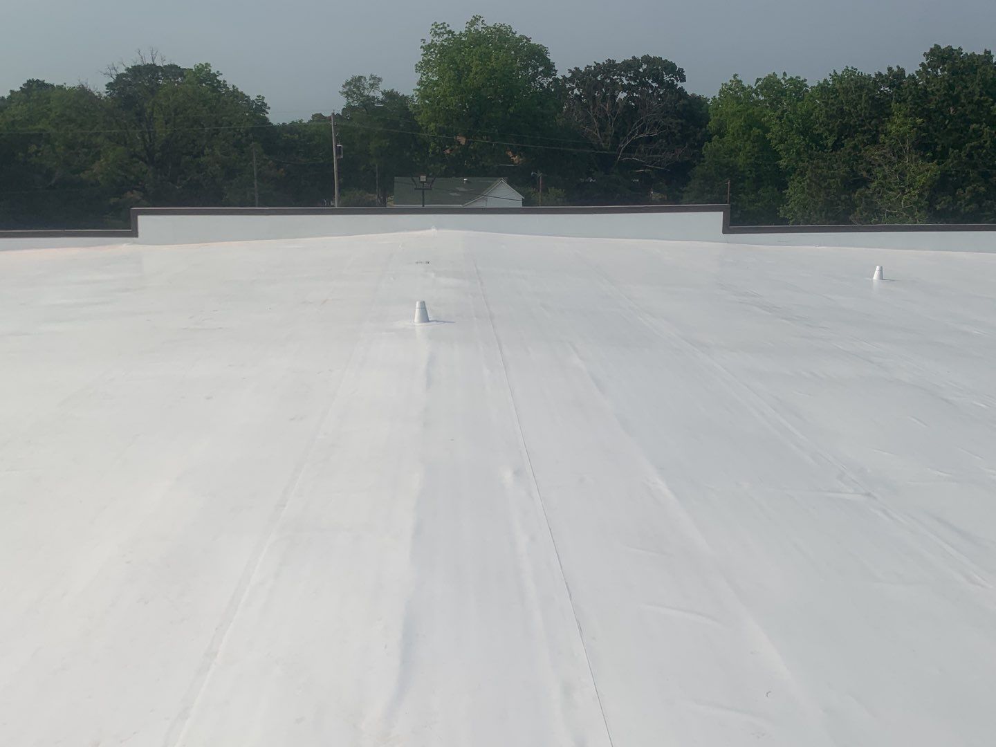 Commercial Roofing Installation using 50 mil PVC by Hostetler Roofing