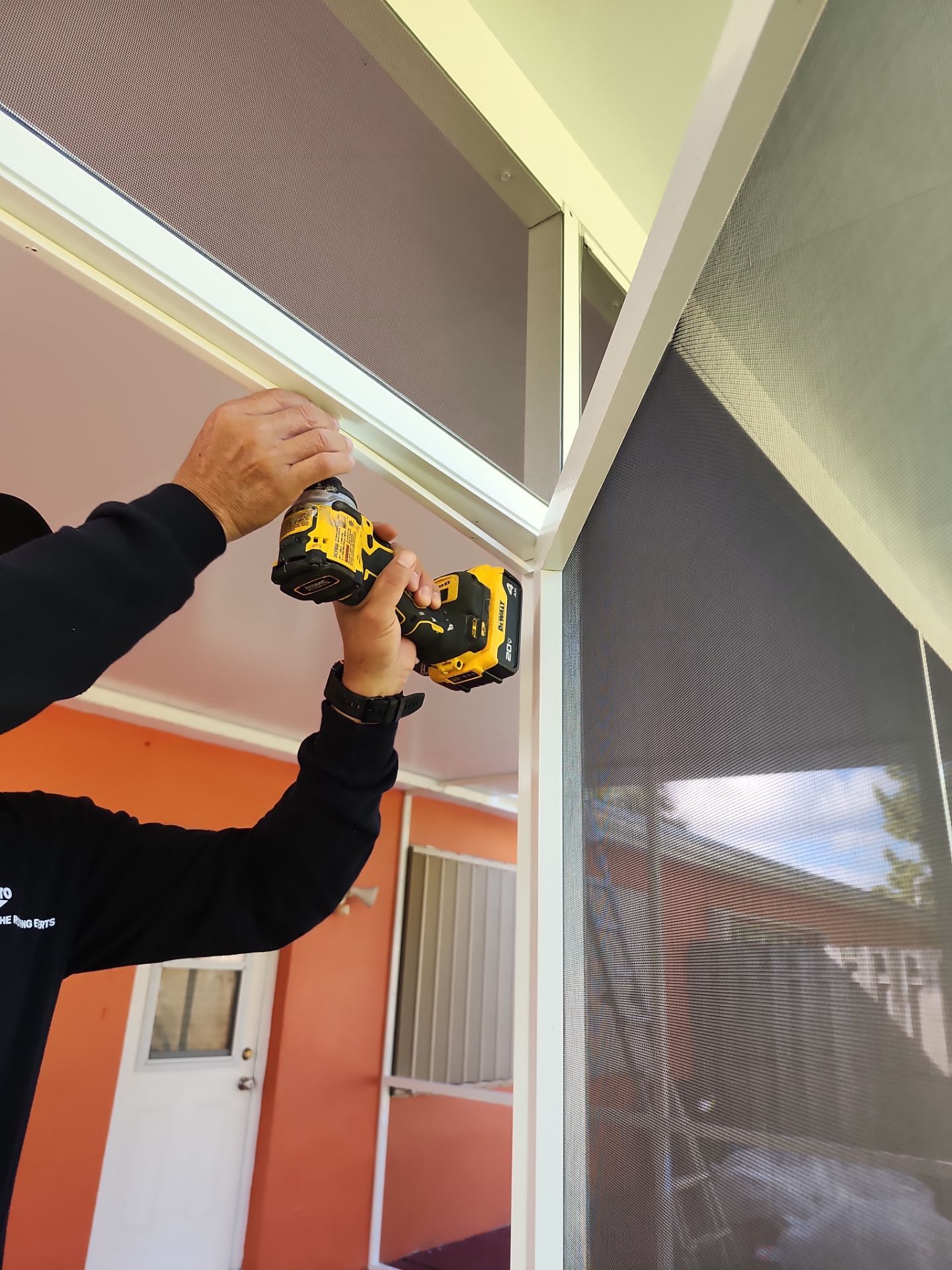 Insulated Screen Enclosure and Wood Tile Deck Installation in Plantation by Aastro Roofing