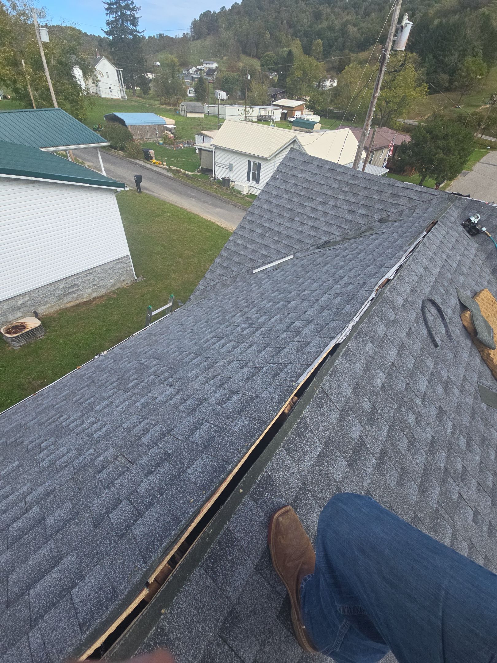 Residential Roofing Installation using GAF Timberline HDZ Oyster Grey by Rainstoppers Roofing