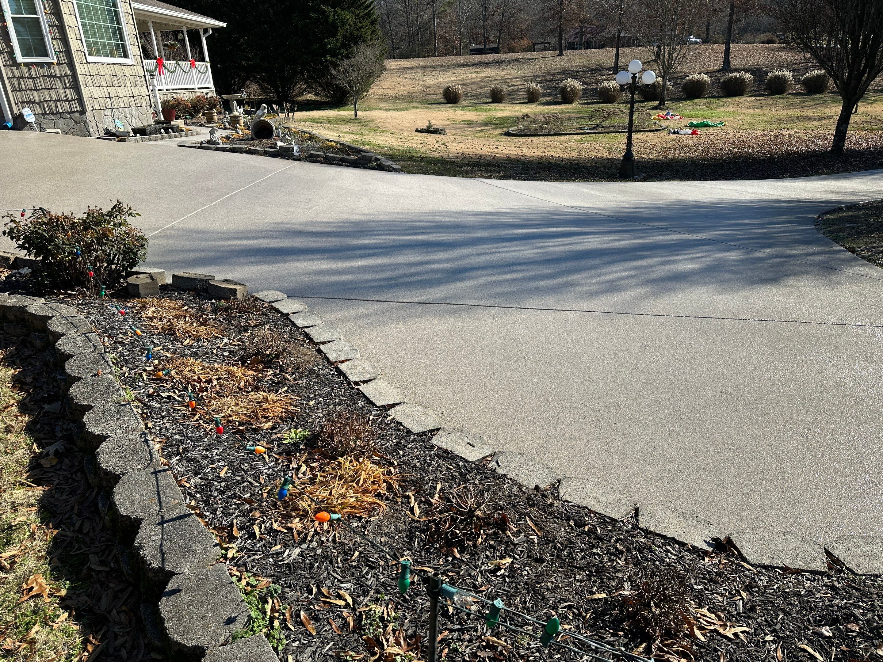 Driveway using Obsidian by Elite Floor Solutions