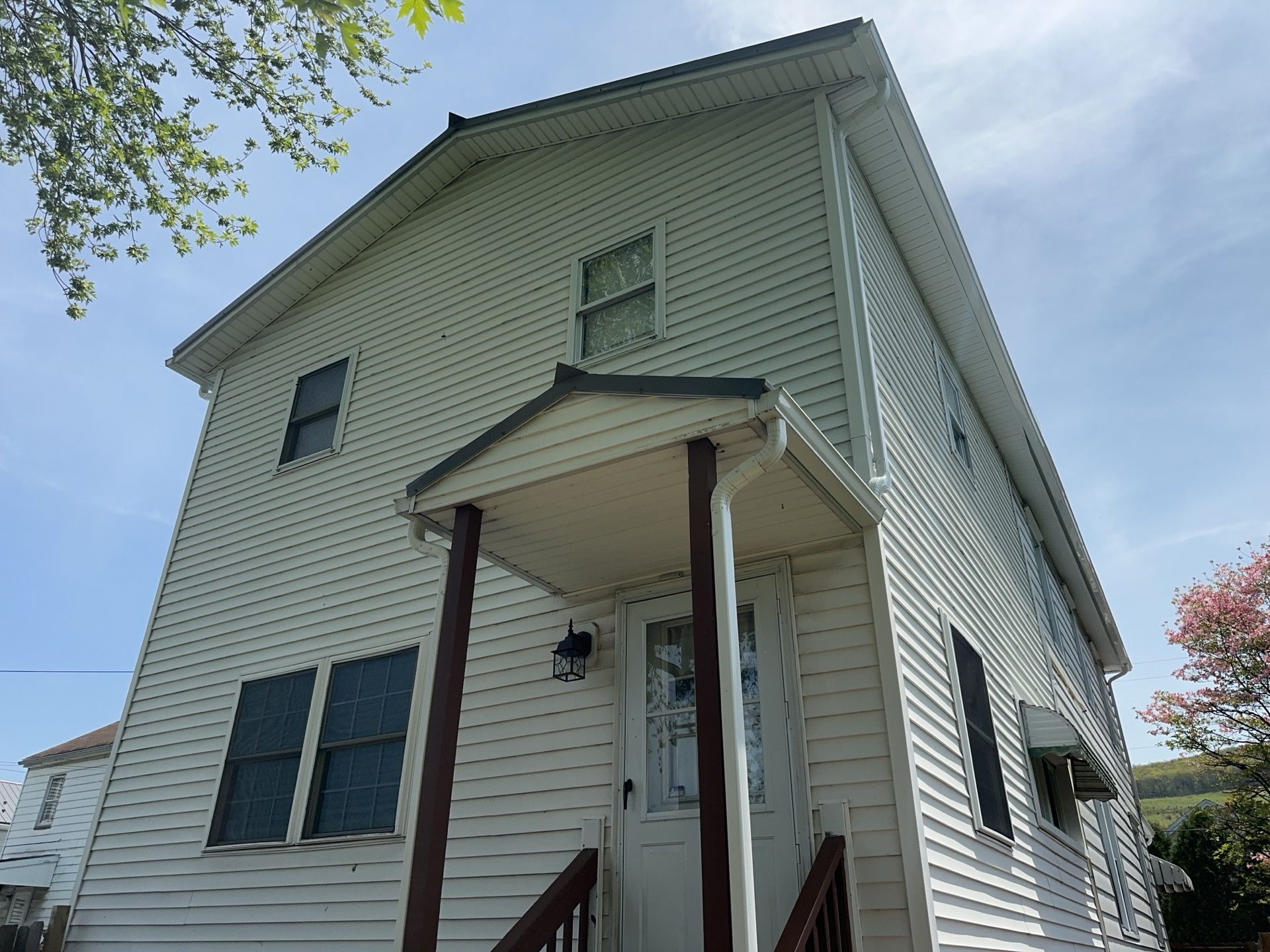 Charcoal Metal Roof & Blue Siding — A Refreshing New Look by Esh Builders