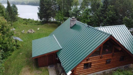 Roof Replacement using 16" Standing Seam Panels by Jay Carter Roofing & Sheet Metal