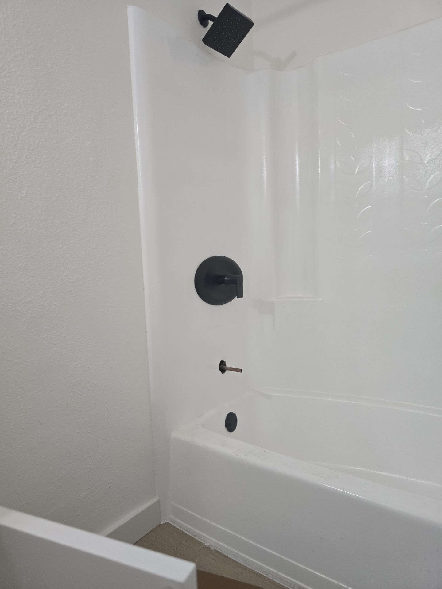 Scope of Work: Installation of Shower, Toilet, Plumbing, Kitchen Sink, and Fixtures by Us Plumbing 