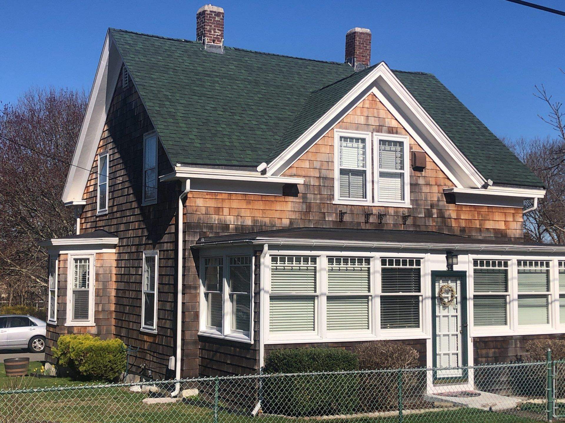 Hunter Green Roofs by Pinnacle Roofing & Skylights