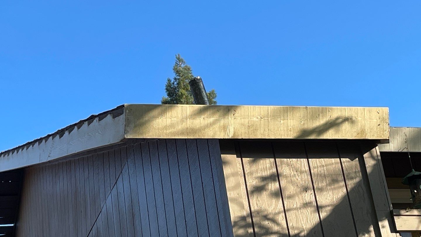 Removed tile from roof and replaced with shingles by Straight Edge Roofing Inc