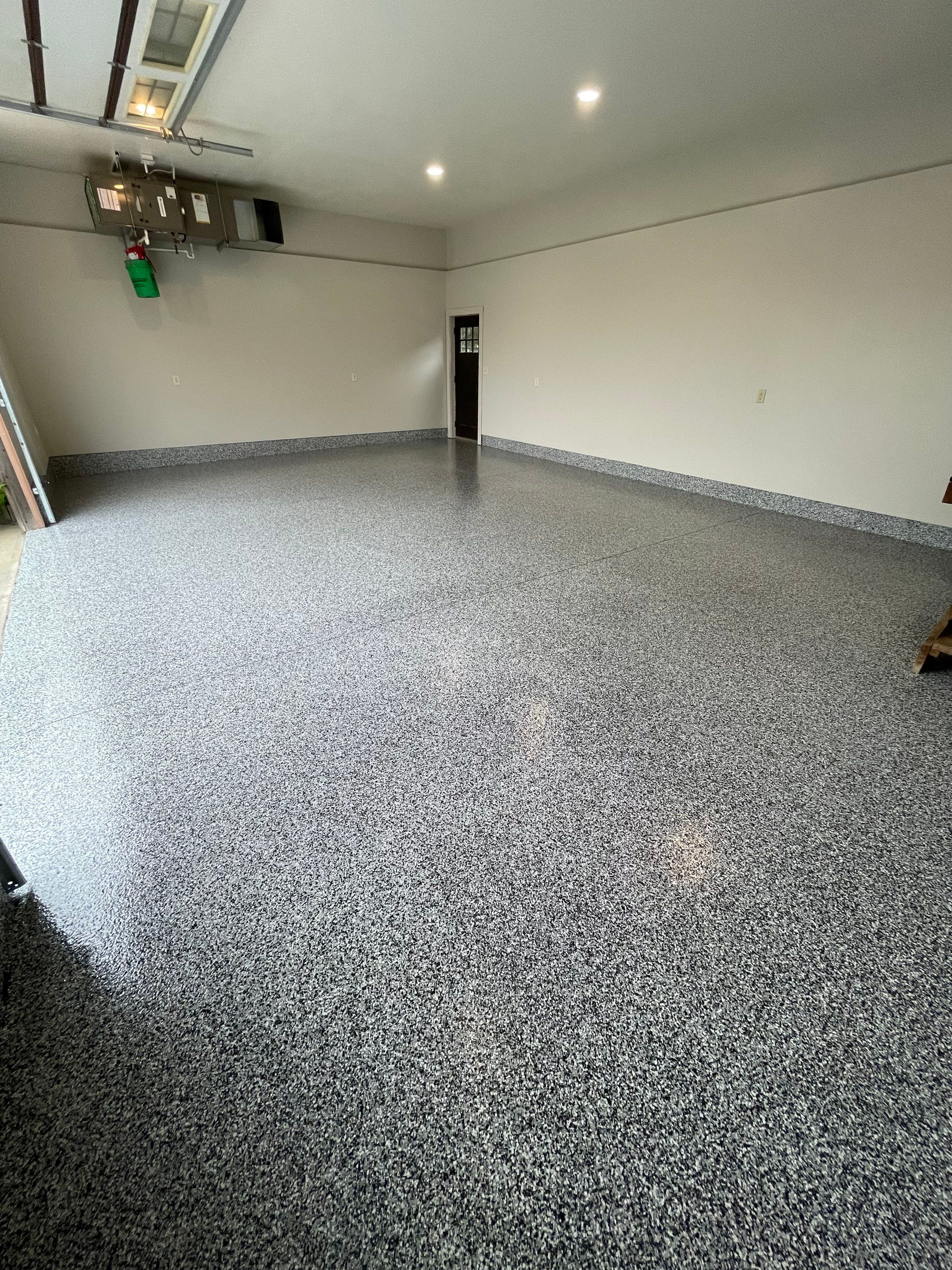 Domino Flake Floor Coating and Crack Repair in Chancellor by Select Painting, Coatings & Garage Cabinets