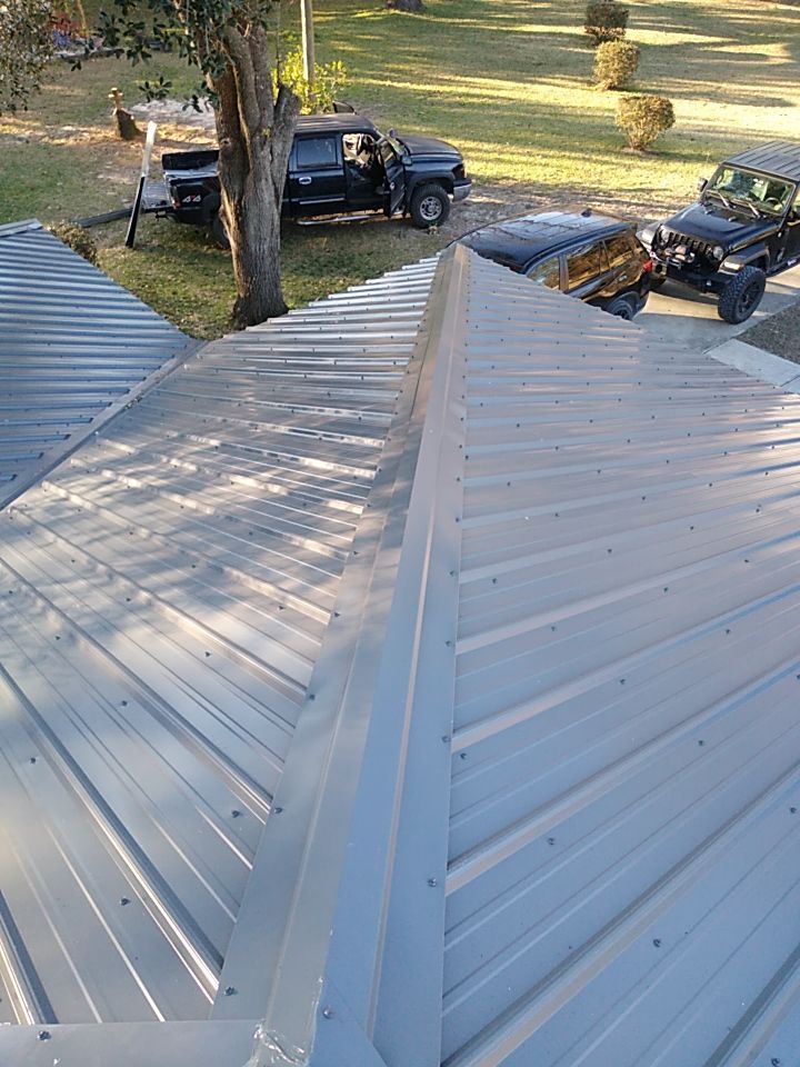 Residential Roofing Installation using Roof Replacement by American Roofing & Construction LLC