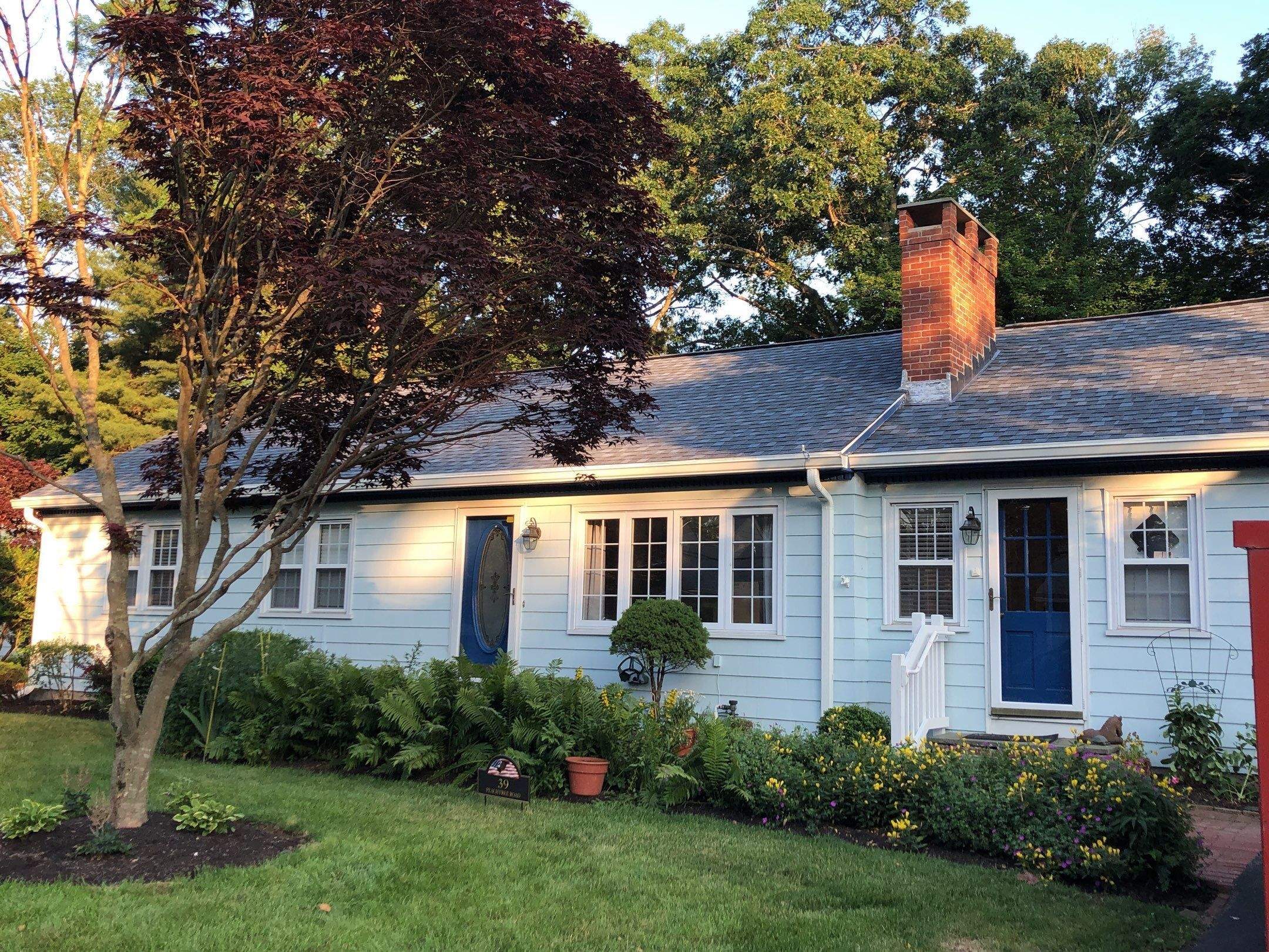 Coastal Blue Roofs by Pinnacle Roofing & Skylights
