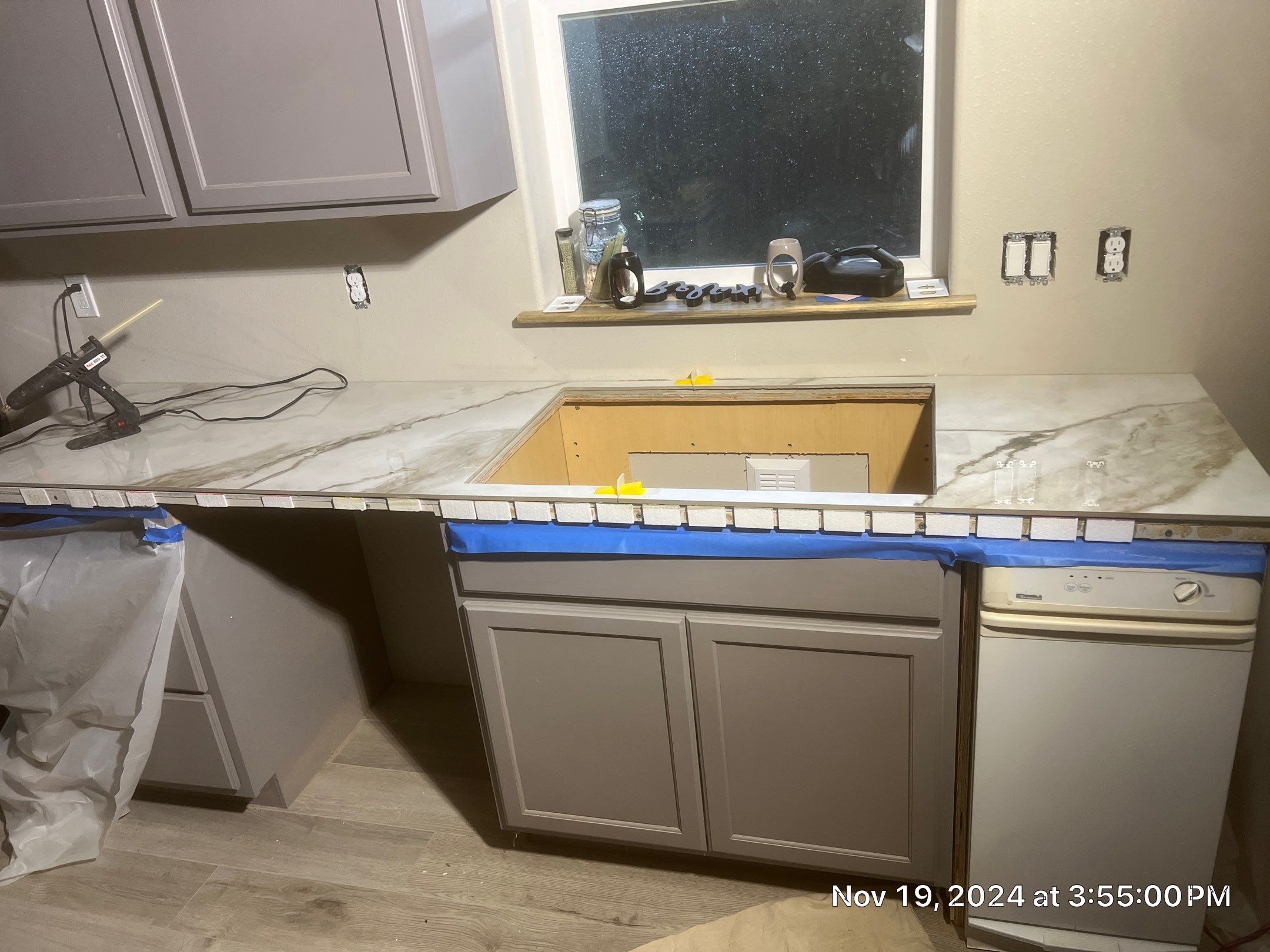 Marble Look Countertop and Stone Tile Backsplash Installation in Brookings by KMD Surfaces INC.