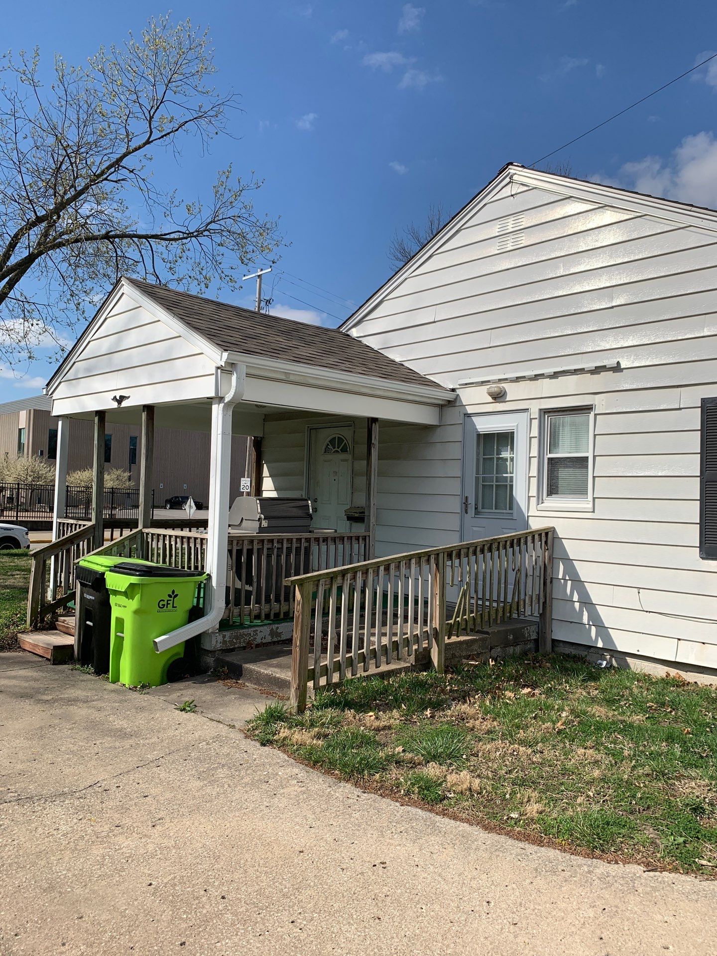 New Cypress Siding going on this North Kansas City Home  by EEC  Windows, Siding & Roofing 