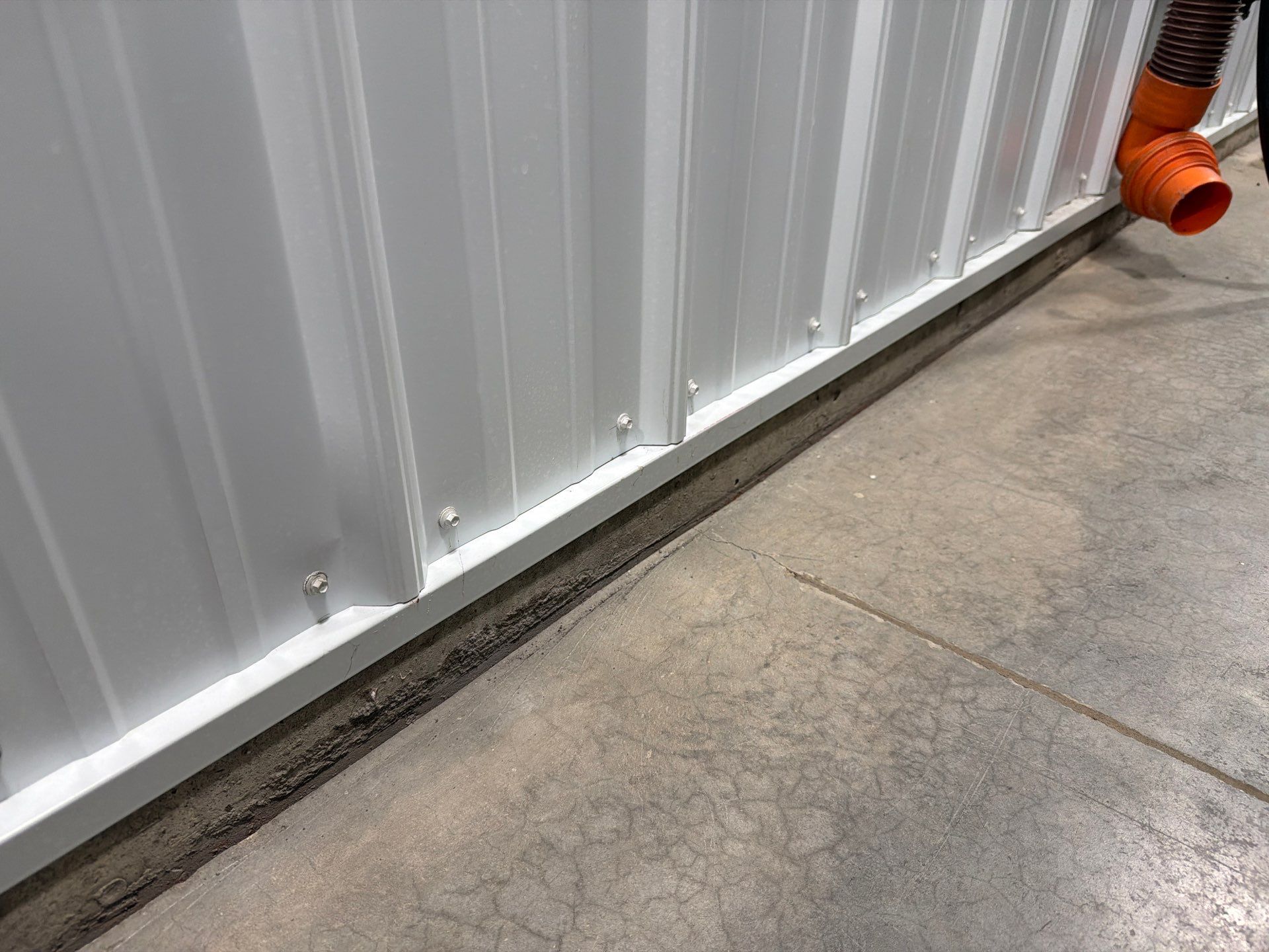 Multi-Stage Concrete Floor Coating for Egan Shop and RV Storage by Select Painting, Coatings & Garage Cabinets