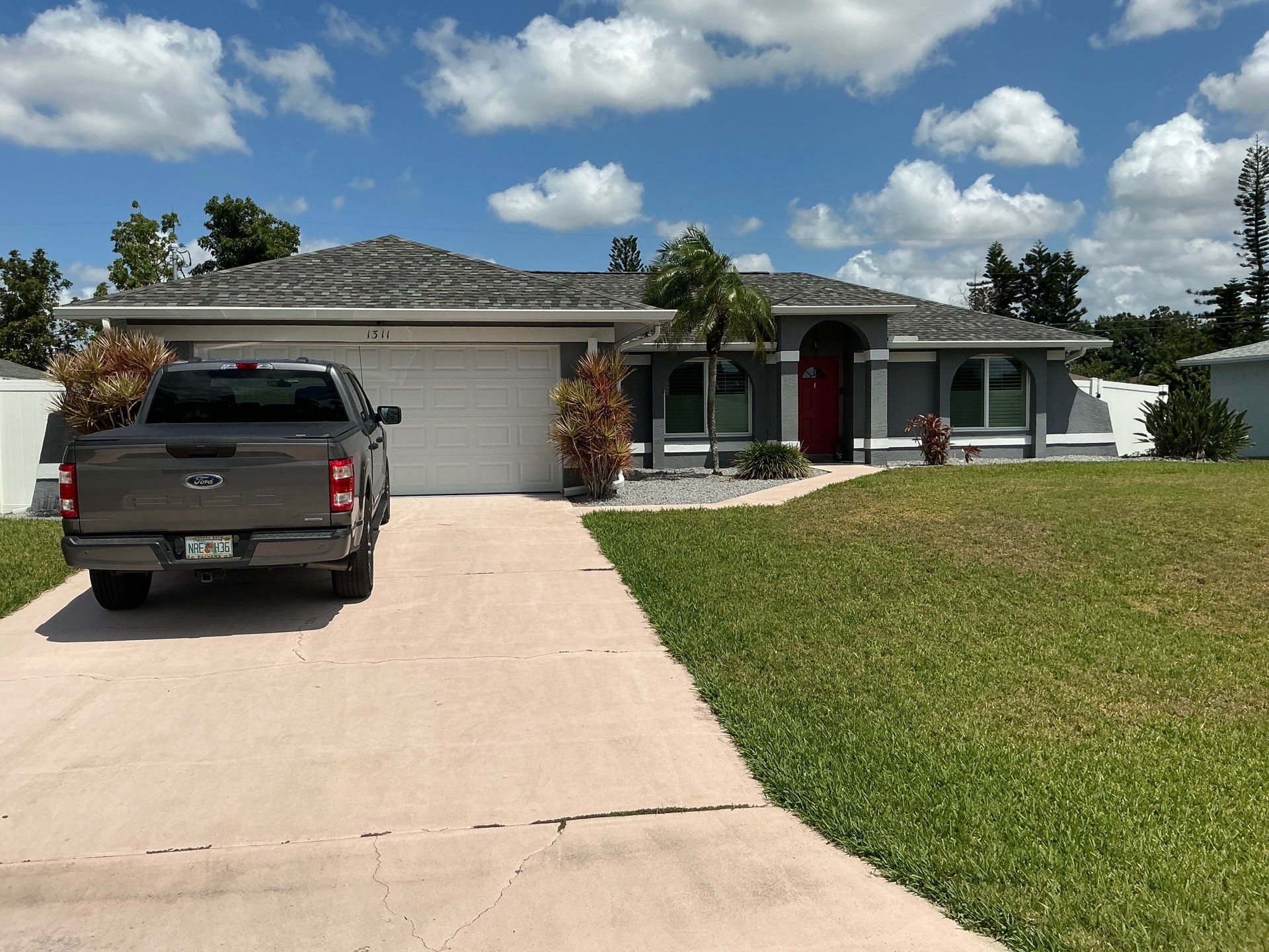 3x4 Downspouts Bronze Installation in Cape Coral FL by Gutter Professors