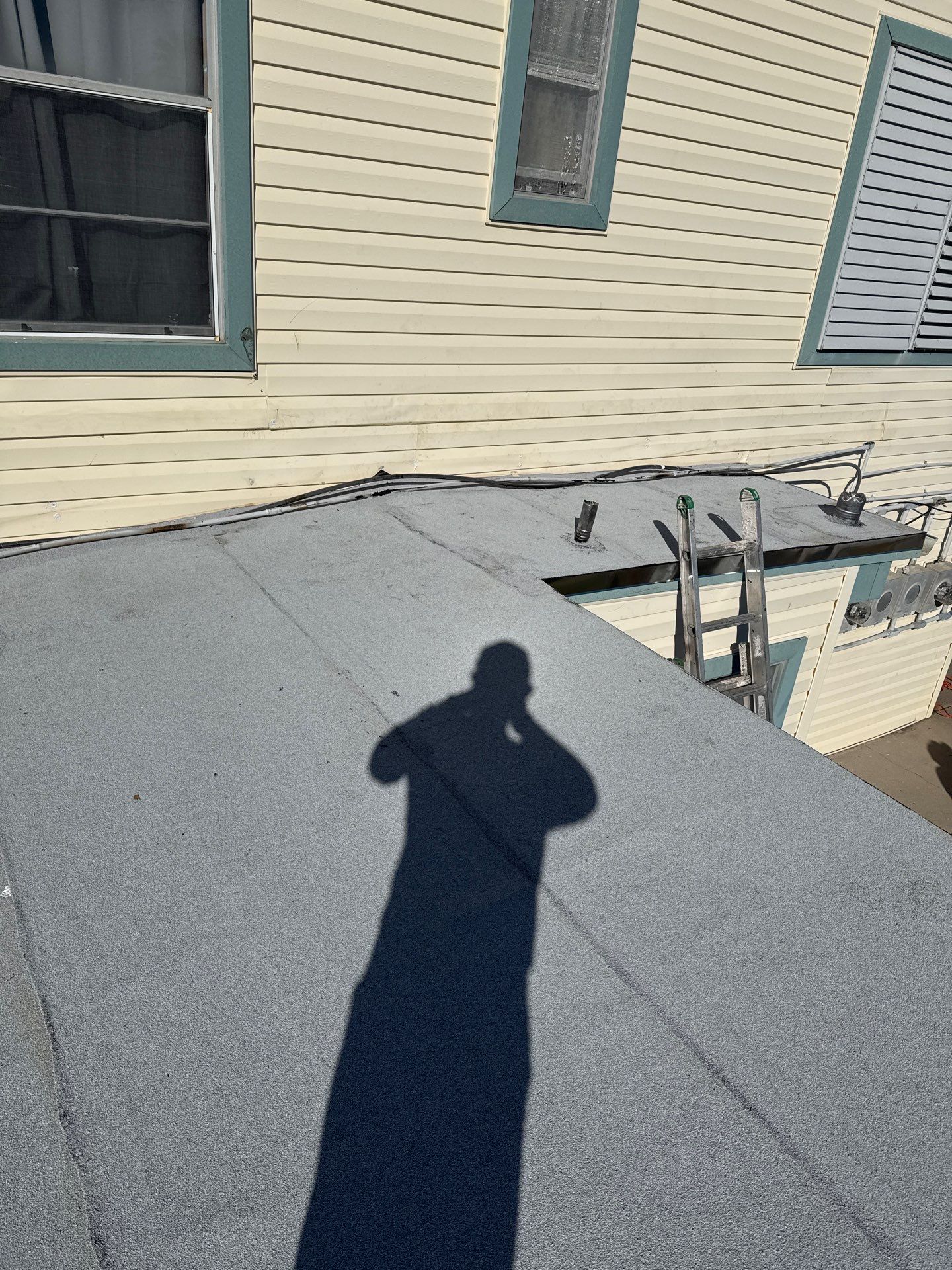 Mustang Island Flat Top by Bayfront Roofing and Construction
