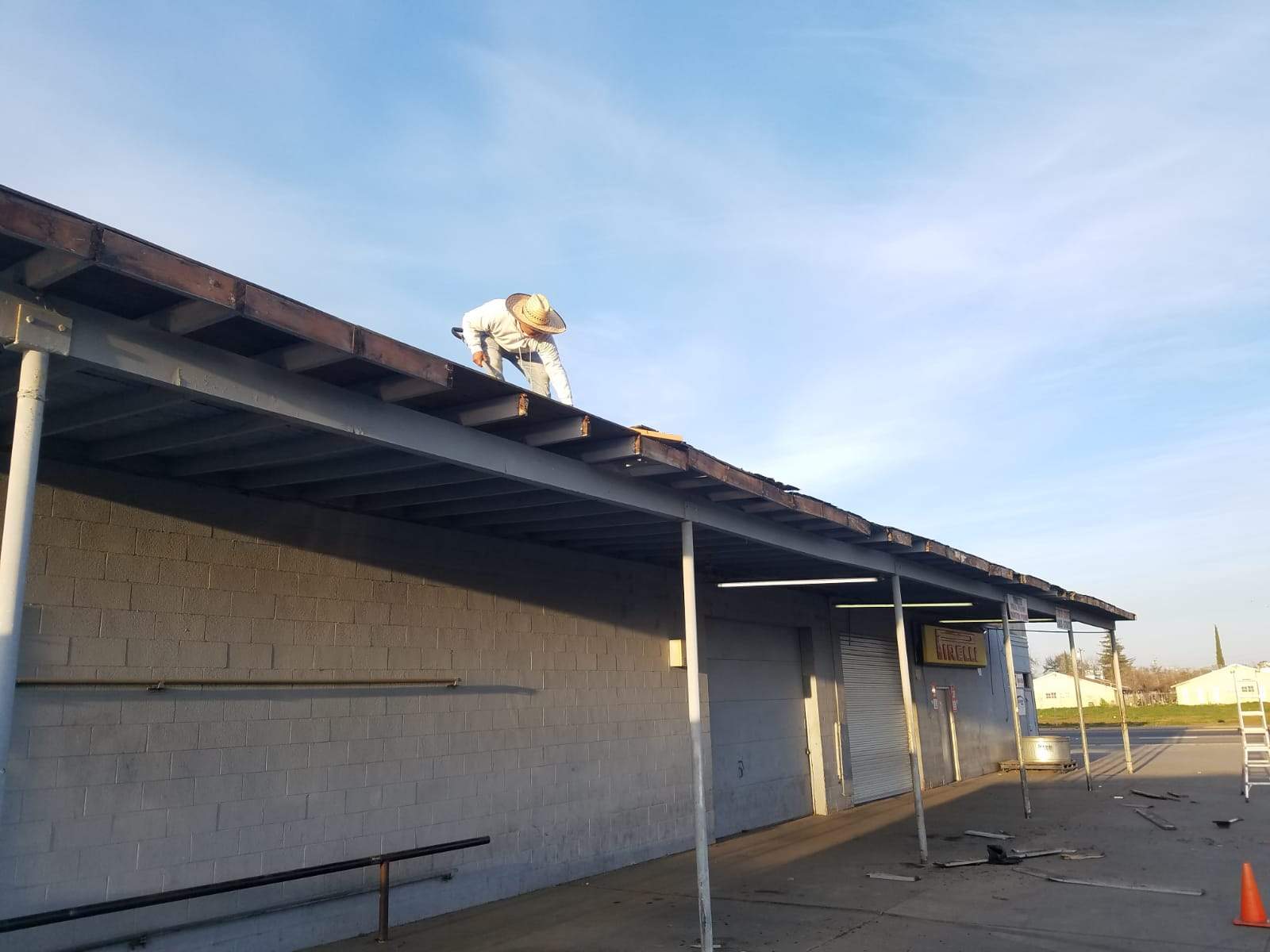 Spray foam and coatings using Conklin Benchmark/PUMA XL coatings and spray foam by Straight Edge Roofing Inc
