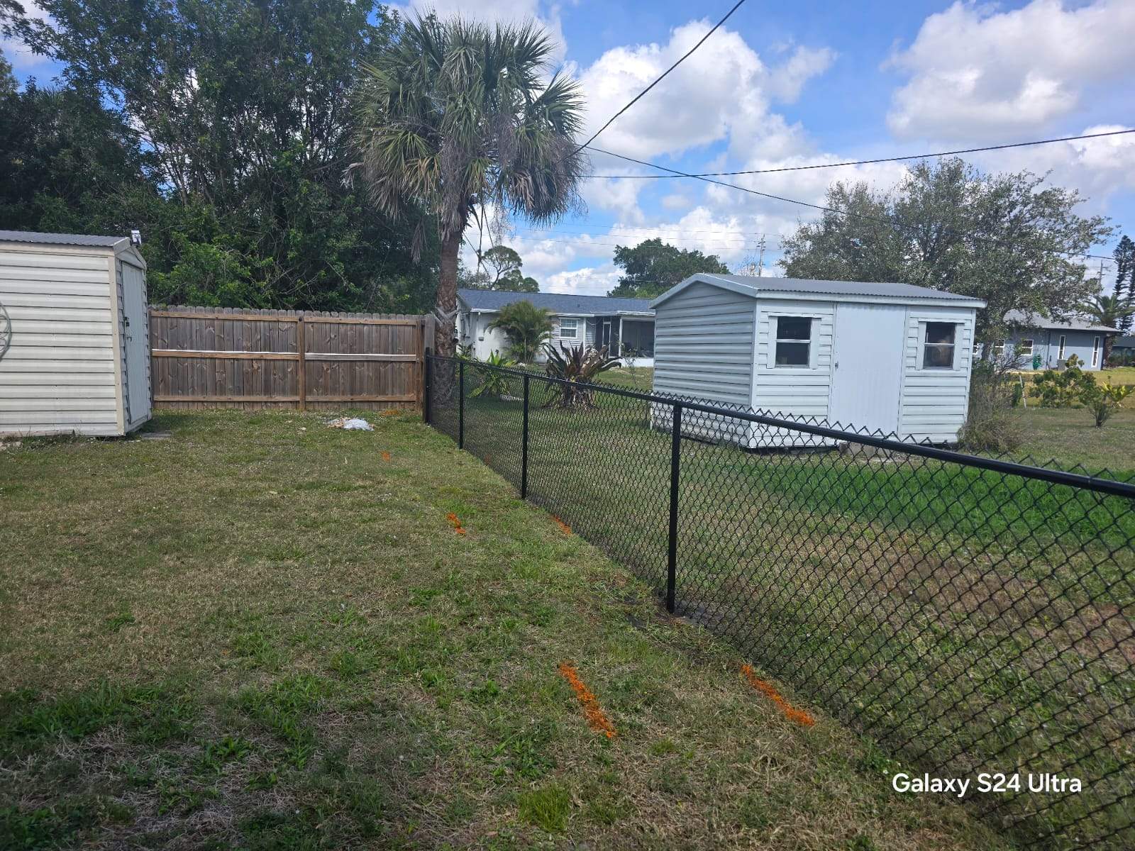 Black Chain Link Fence Installation for Port Charlotte Residence by True Fence LLC