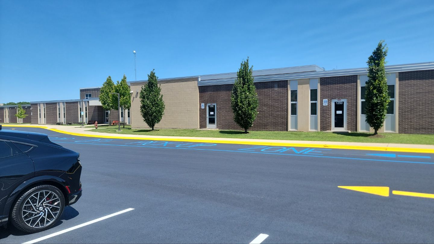 commercial pressure washing using Algaecide, soft wash soap by Northern Power Washing LLC.