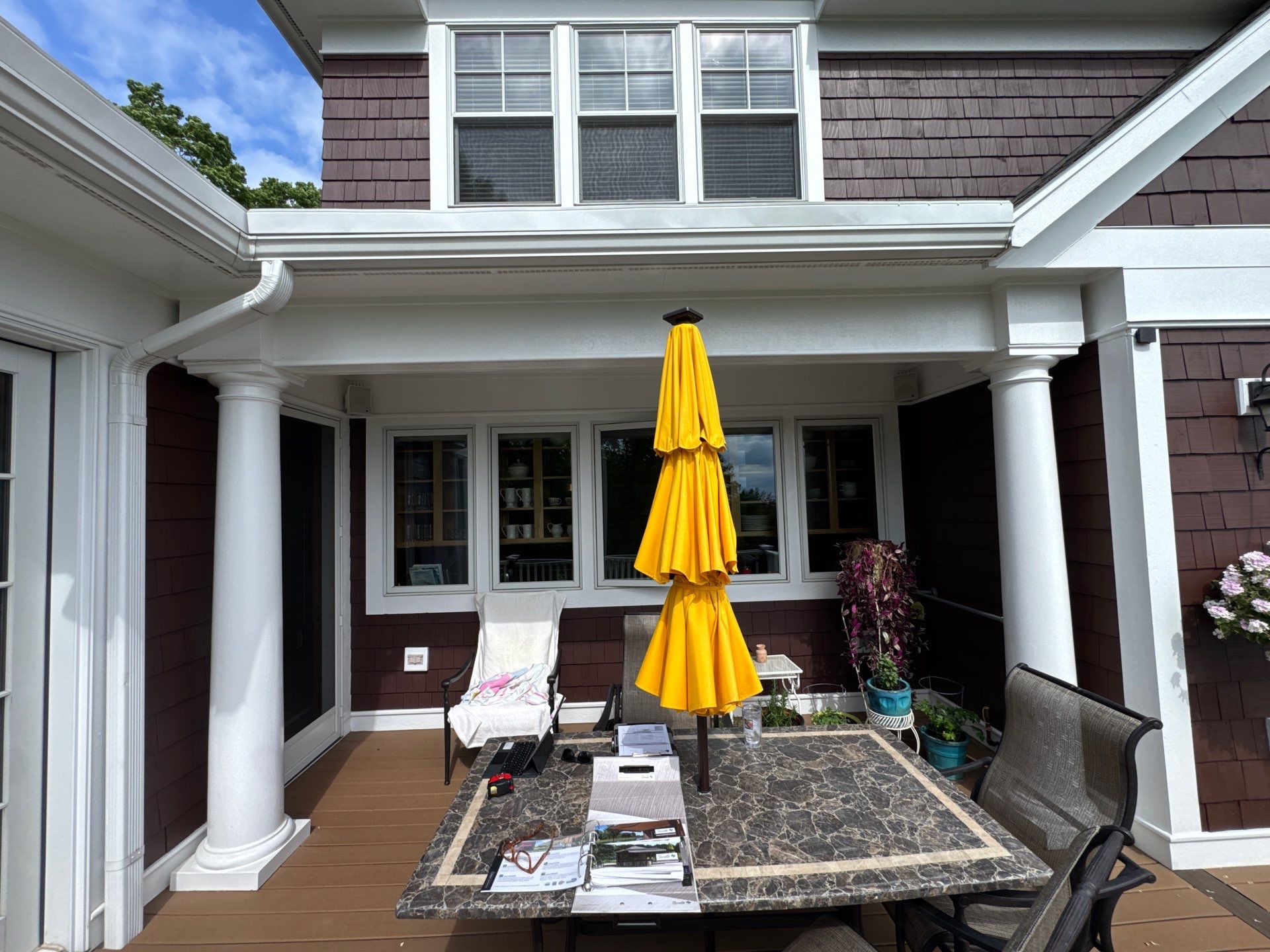 Sunesta Retractable Awning Installation in Harbor Springs by Rainbow Seamless Systems